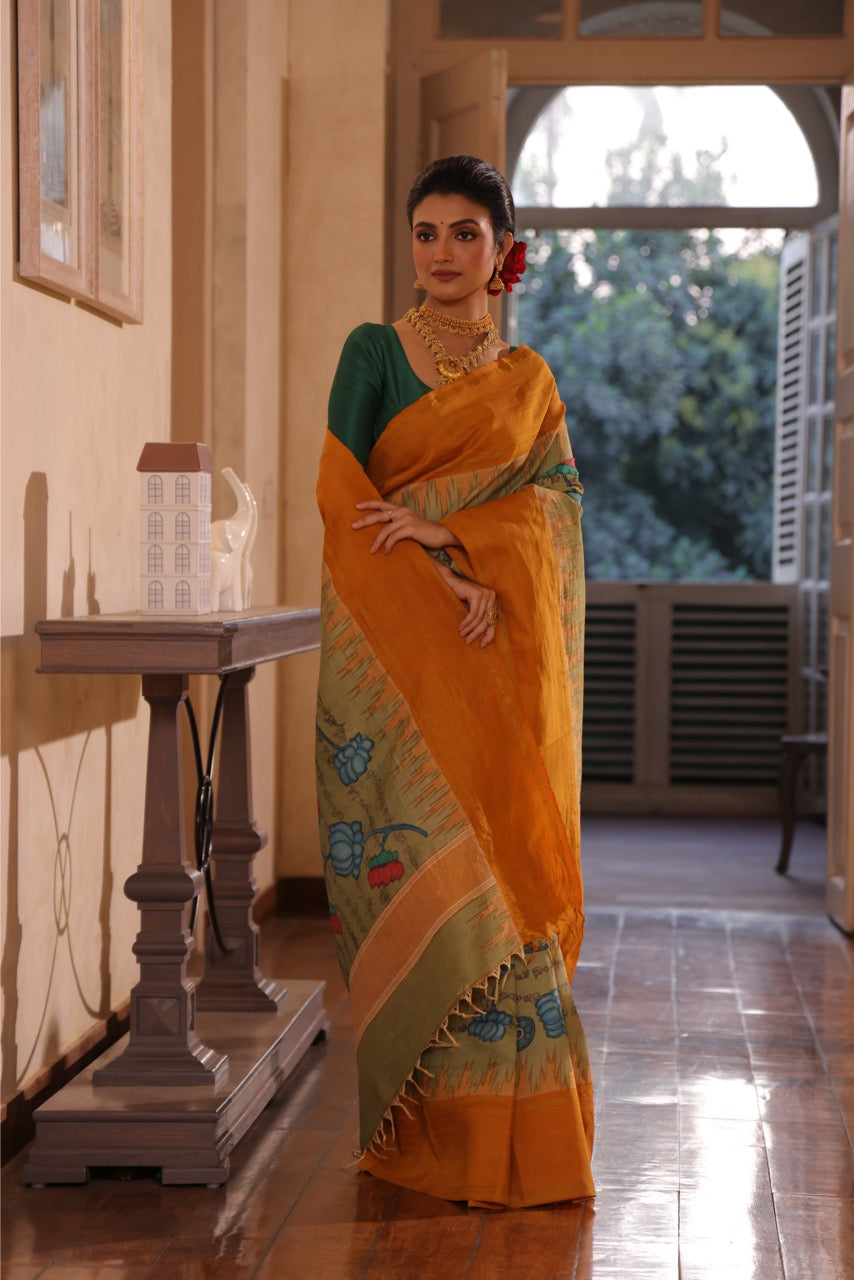 A gorgeous korvai kanchivaram silk saree with handdrawn handpainted penkalamkari Ramayana scripts