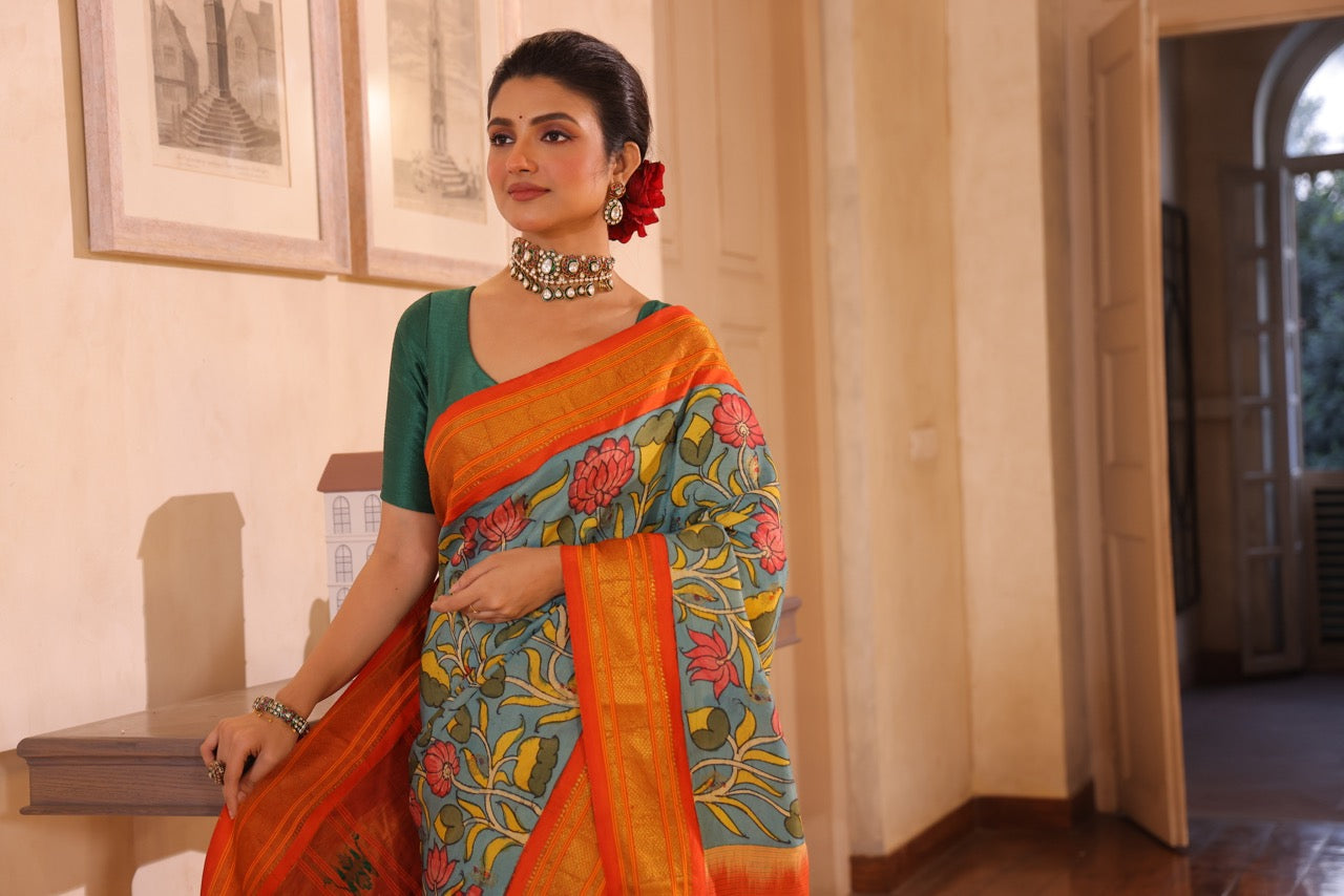 An Uber chic handwoven maharani paithani silk saree with handdrawn and handpainted penkalamkari
