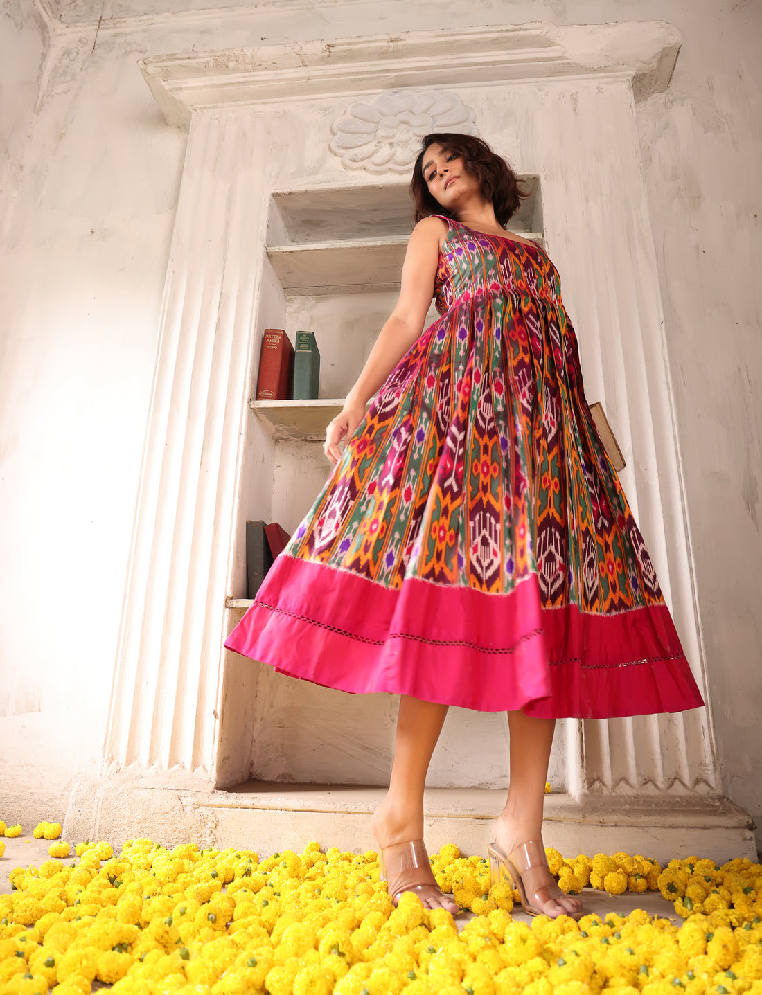 An Uber exclusive ready to wear shoulder strapped fit and flare midi dress