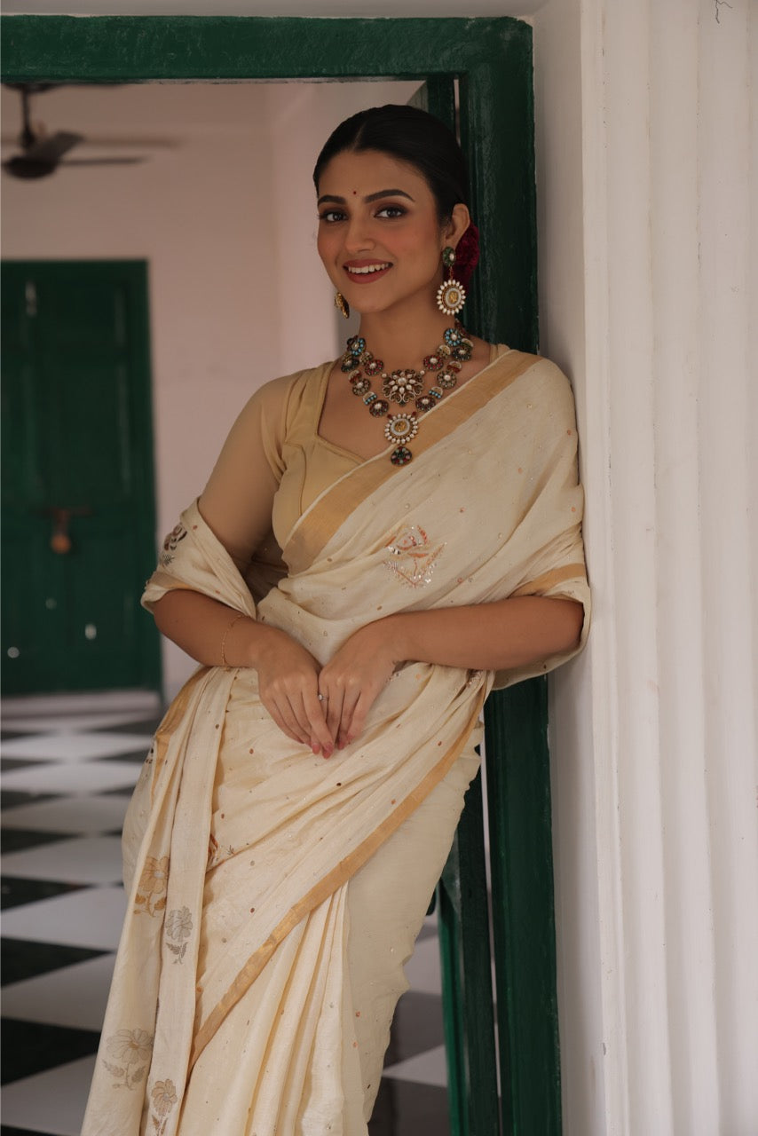 Stunner mukesh badla work tussar by mulberry silk saree with jacquard weave florals on pallu