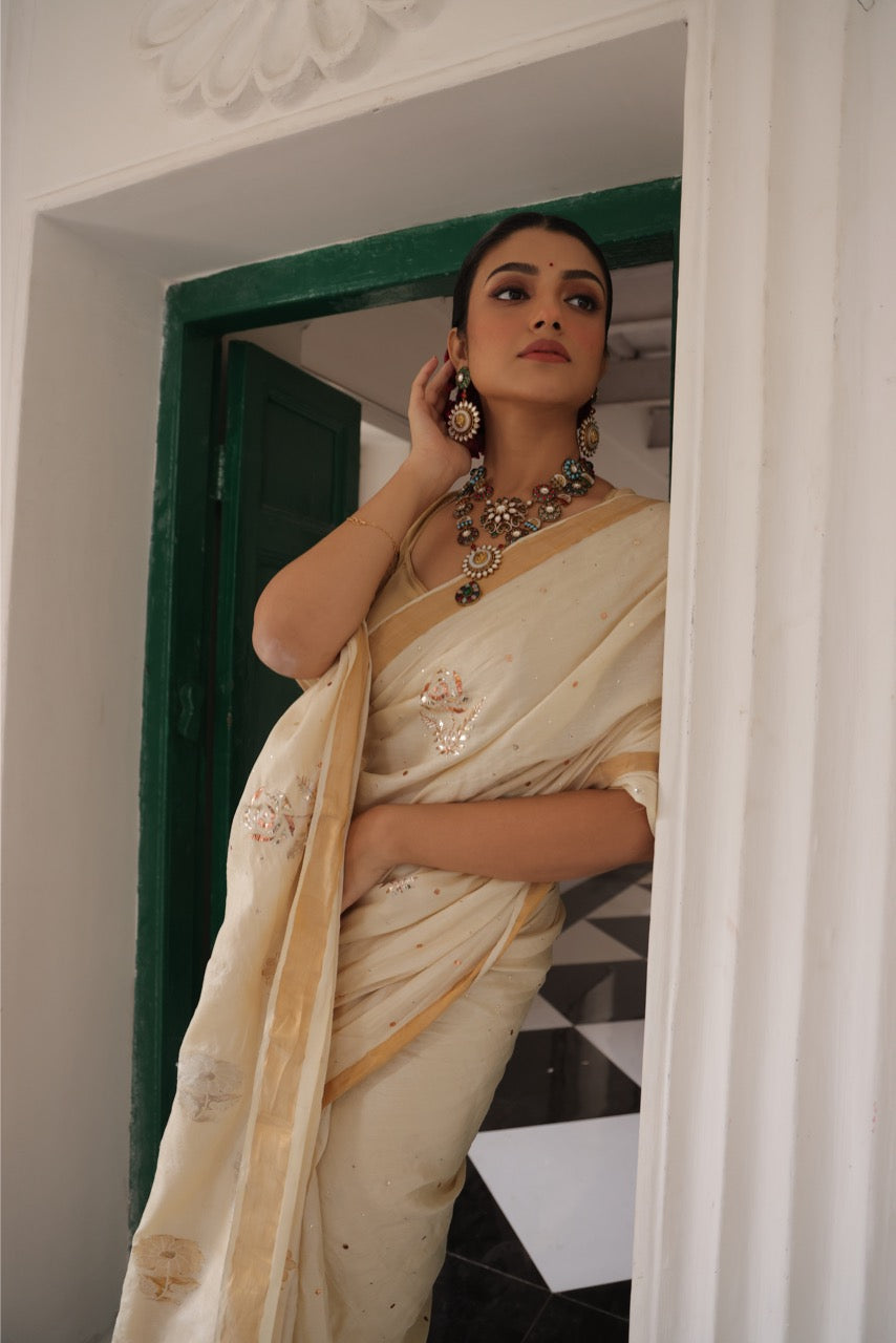 Stunner mukesh badla work tussar by mulberry silk saree with jacquard weave florals on pallu
