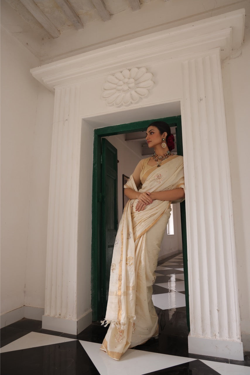 Stunner mukesh badla work tussar by mulberry silk saree with jacquard weave florals on pallu
