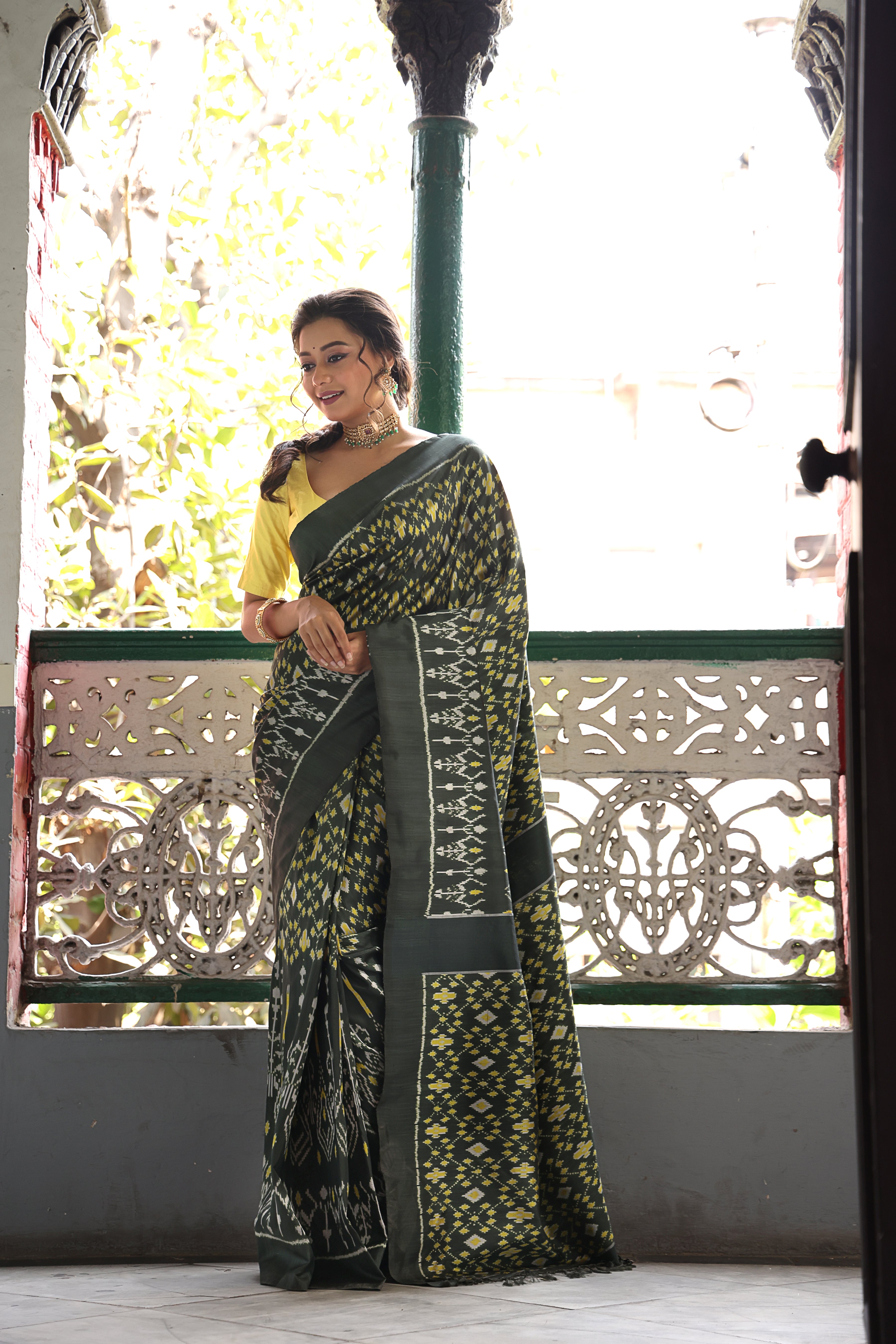 A vivacious Viridian green Cambodian silk ikkat saree - Museum archive piece