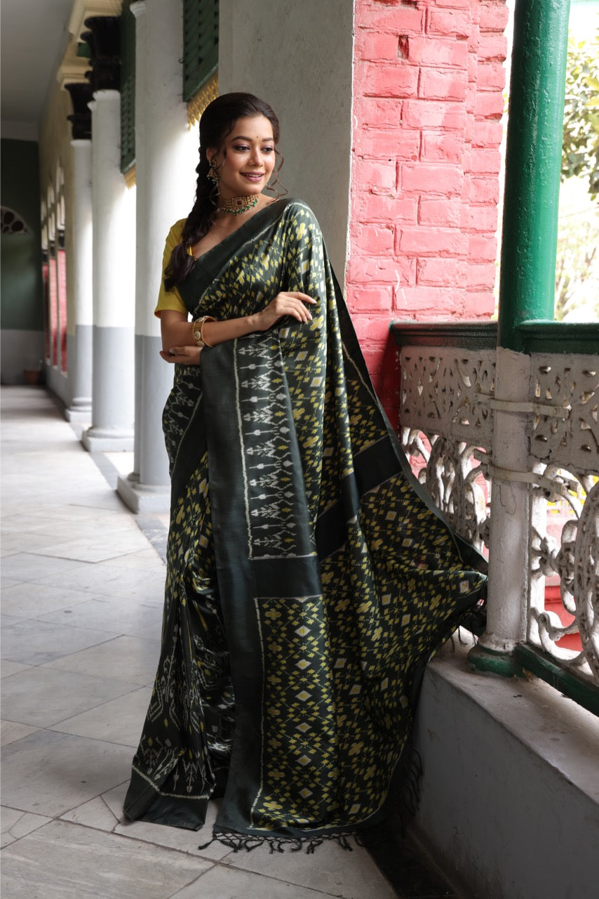 A vivacious Viridian green Cambodian silk ikkat saree - Museum archive piece