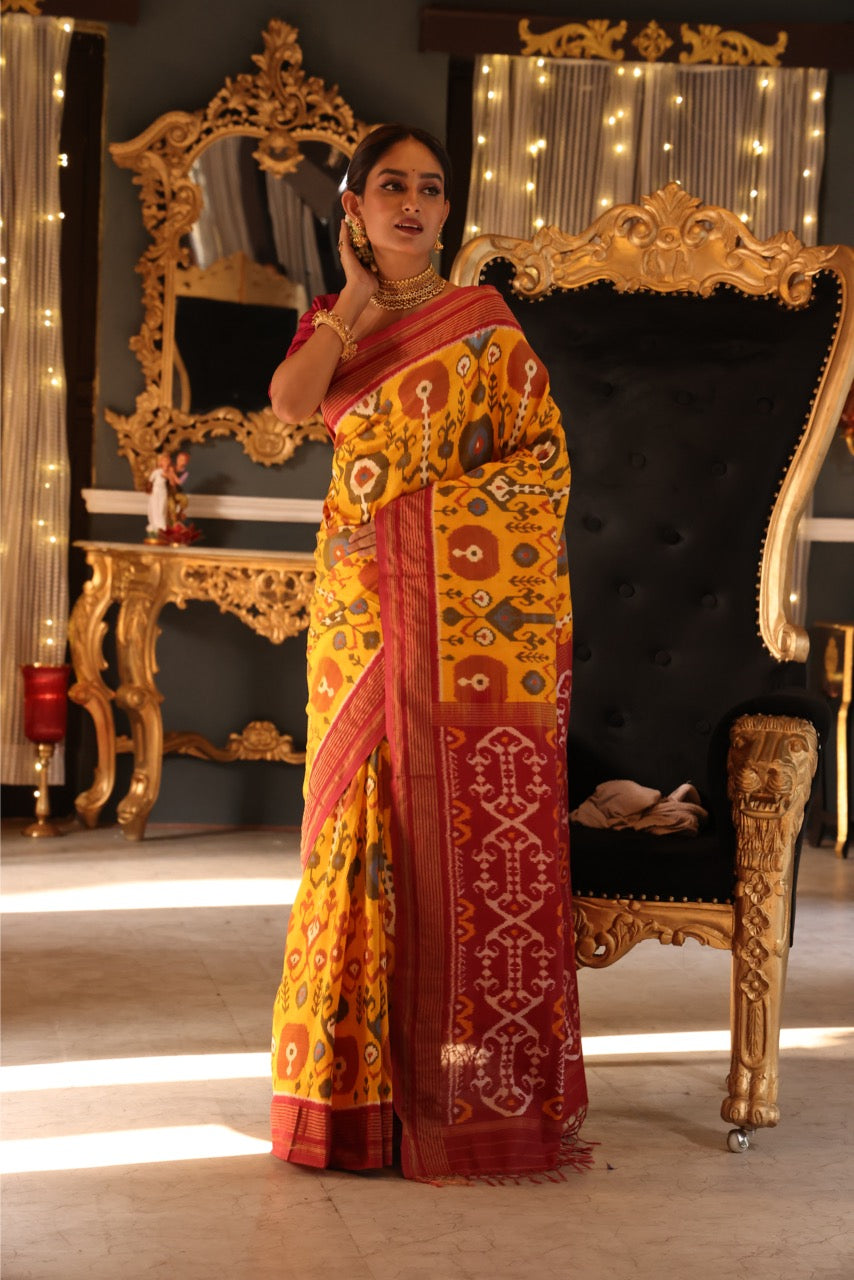 A stunner mustard yellow by deep burgundy premium tussar by mulberry silk ikkat SAREE