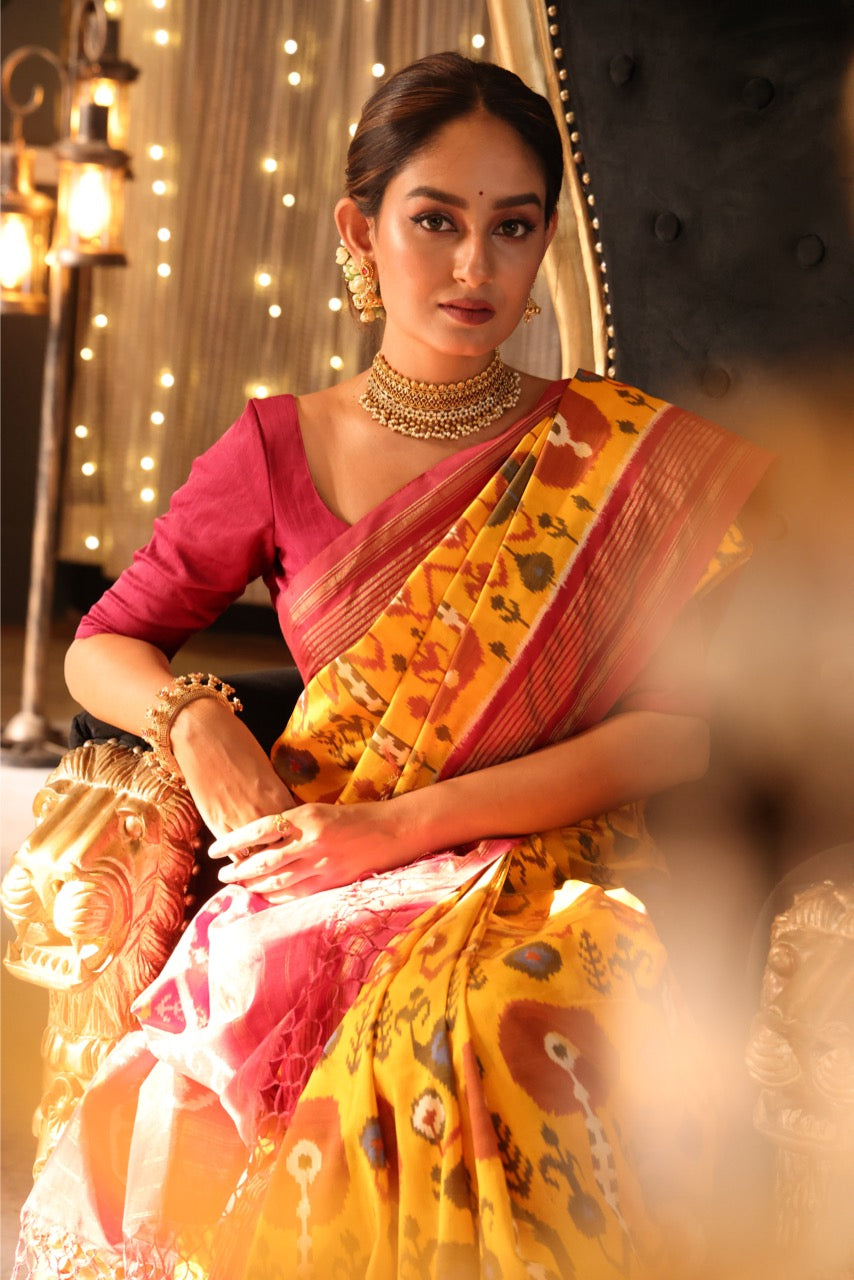 A stunner mustard yellow by deep burgundy premium tussar by mulberry silk ikkat SAREE