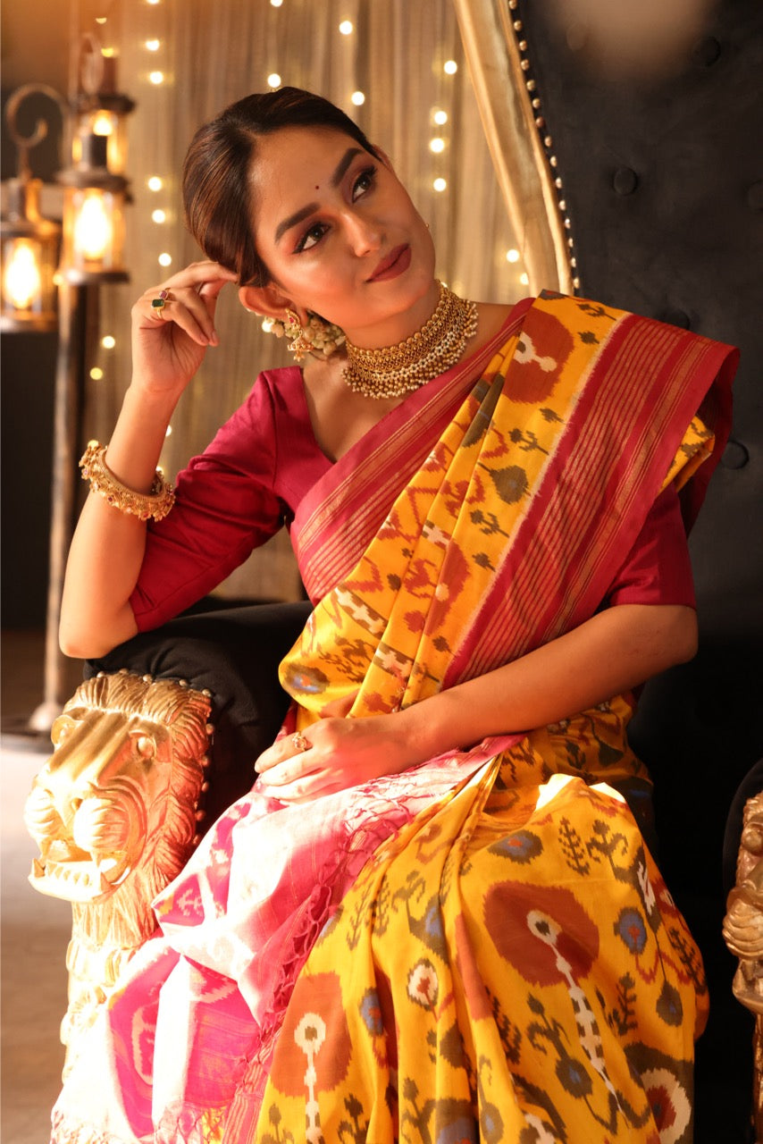 A stunner mustard yellow by deep burgundy premium tussar by mulberry silk ikkat SAREE