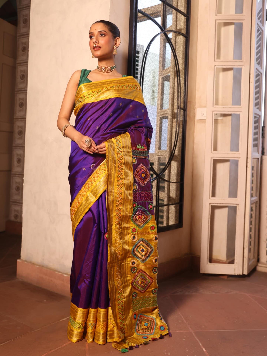 lambani embroidery with mirror work crafted on pure korvai kanchivaram silk