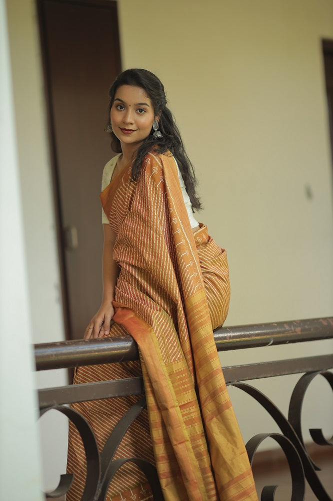 Natural Dye Silk Ikkat Saree In Lehariya Pattern In muted Gold Shade