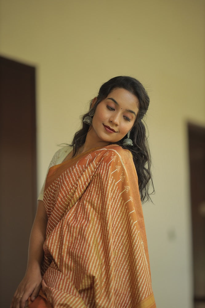 Natural Dye Silk Ikkat Saree In Lehariya Pattern In muted Gold Shade