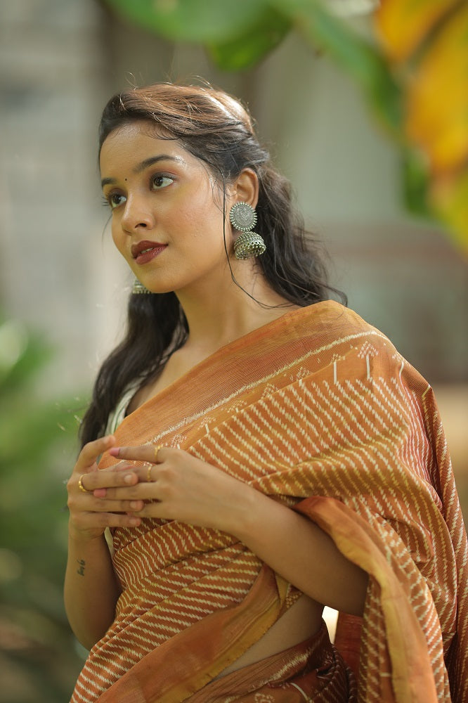 Natural Dye Silk Ikkat Saree In Lehariya Pattern In muted Gold Shade