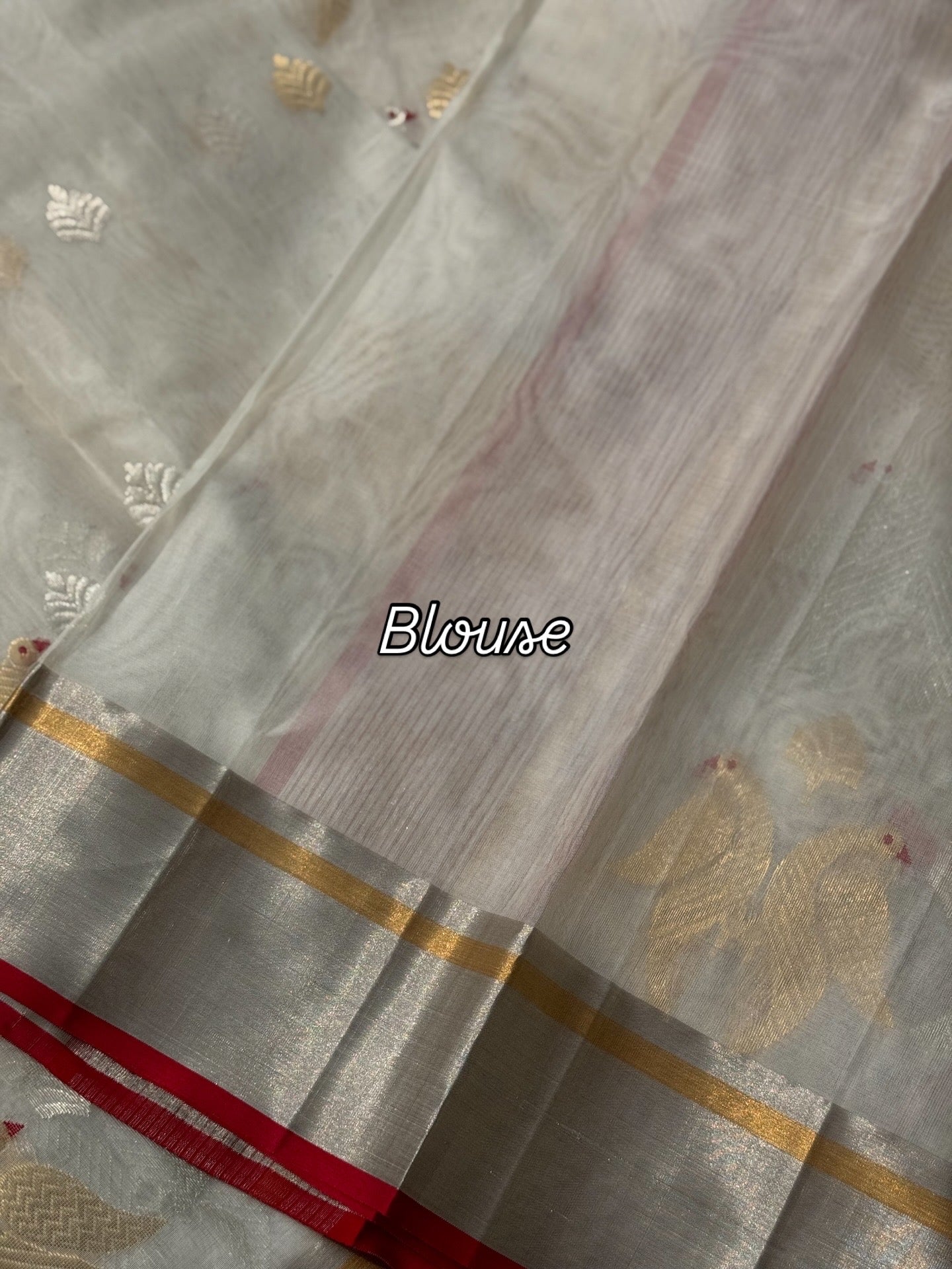 A ivory white handwoven chanderi silk saree with full jaal weave ek naal and meenakari