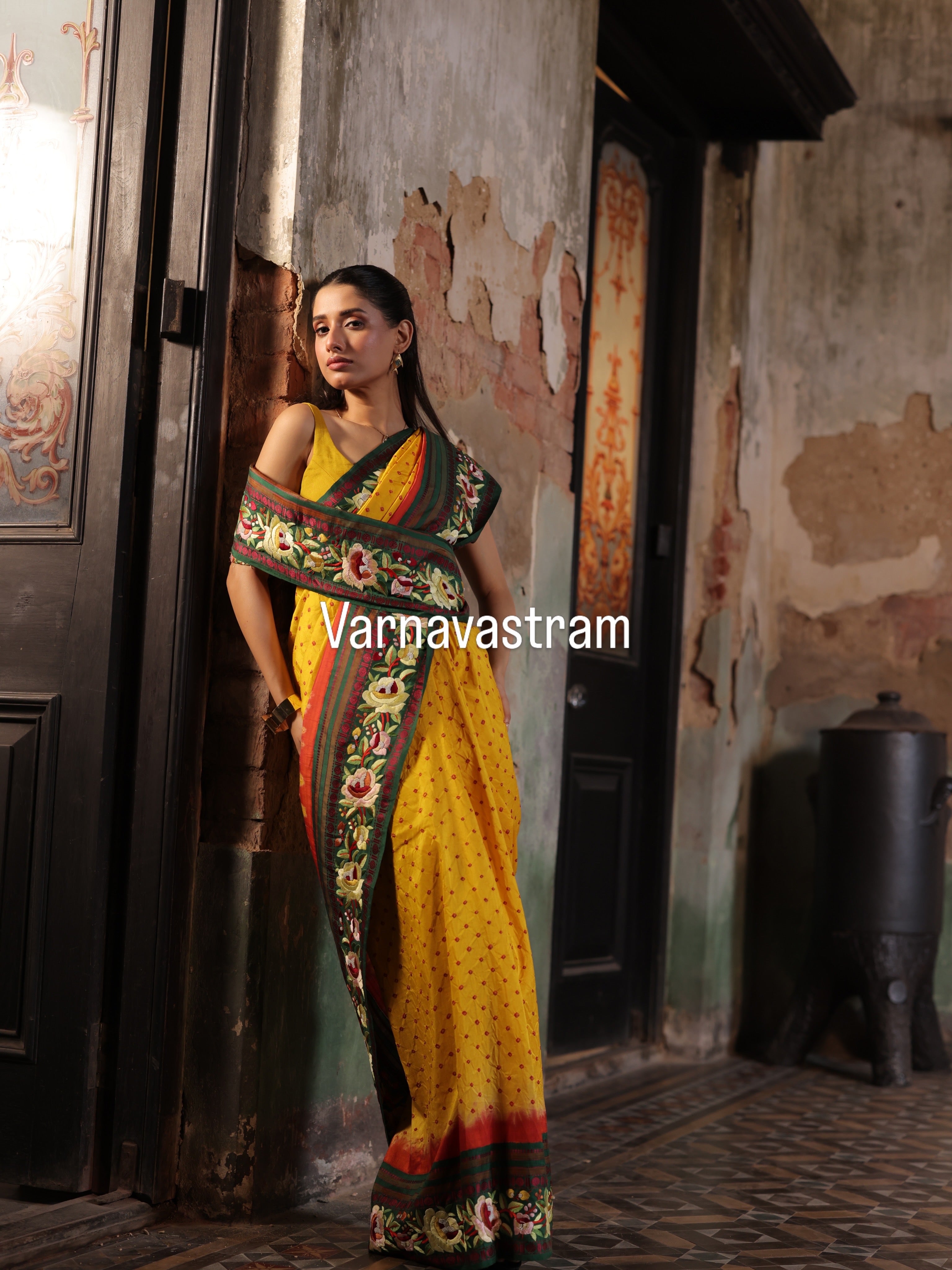 Parsi Gara with Rai Bhandej stunning Korvai Kanchivaram in sunshine yellow framed by the tender green