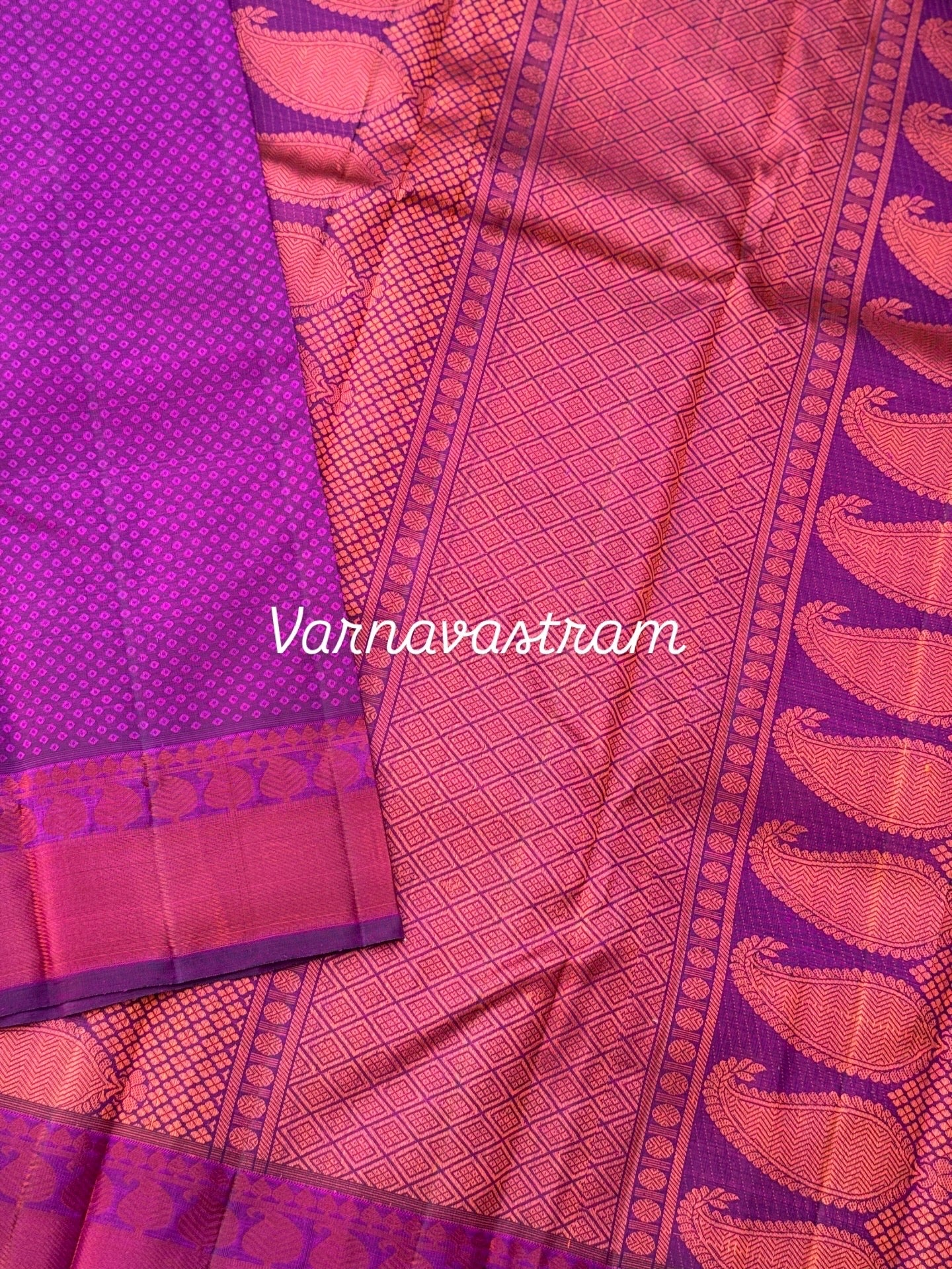 A gorgeous plum pink shade no zari kanchivaram silk saree with bambaramkan motifs