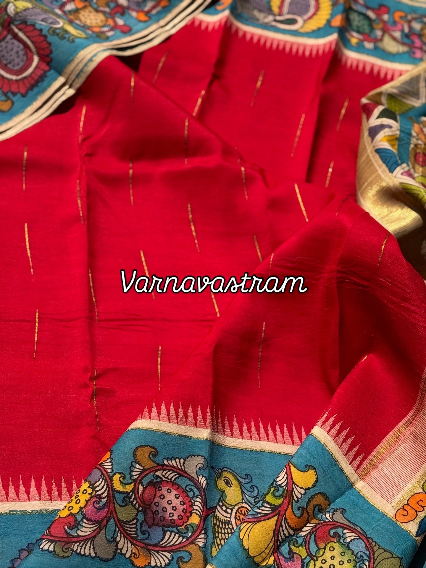A gorgeous red korvai kanchivaram silk saree with korvai border Handdrawn and handpainted penkalamkari