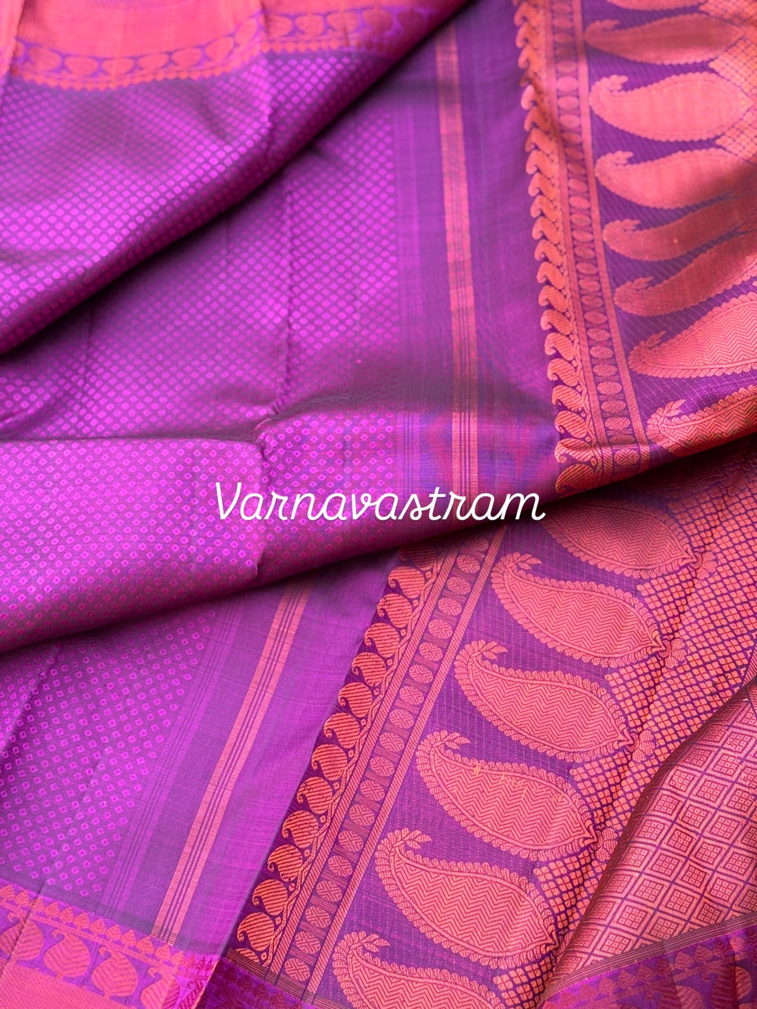A gorgeous plum pink shade no zari kanchivaram silk saree with bambaramkan motifs