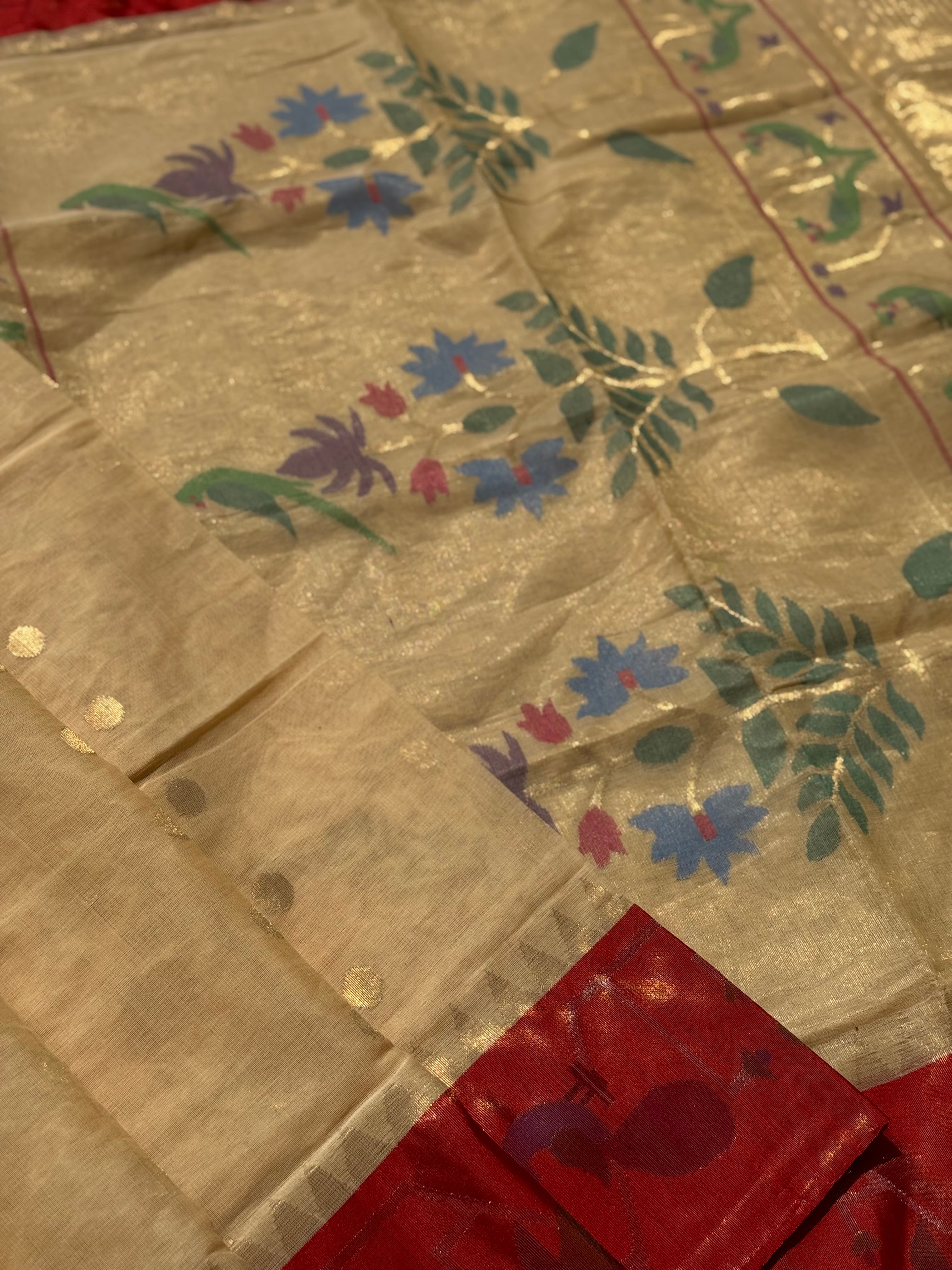 A Designer Exclusive Jaal Weave Ponduru Khadhi Jamdani with tissue Muniya paithani border with Peacock and Parrots
