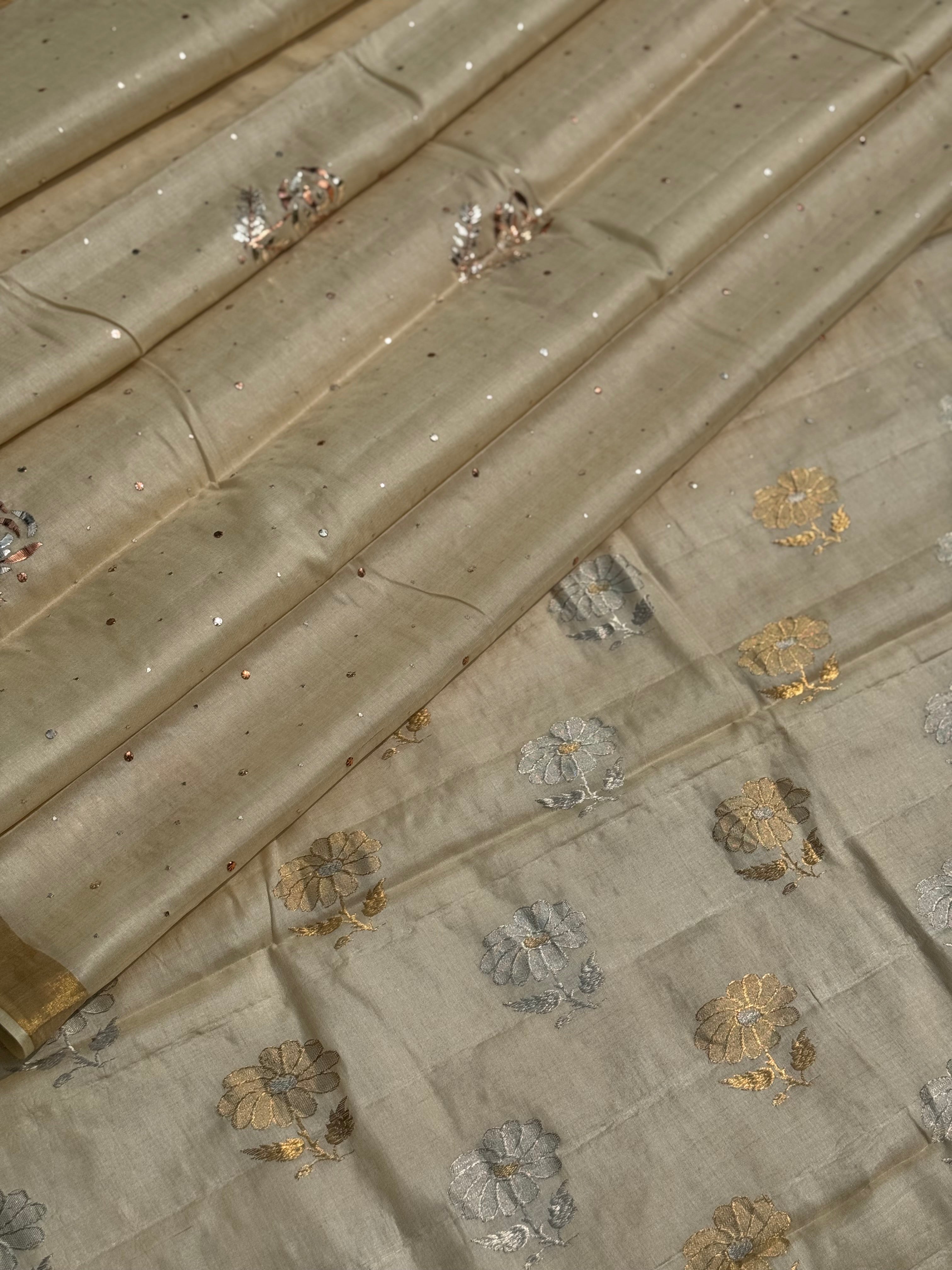 Stunner mukesh badla work tussar by mulberry silk saree with jacquard weave florals on pallu