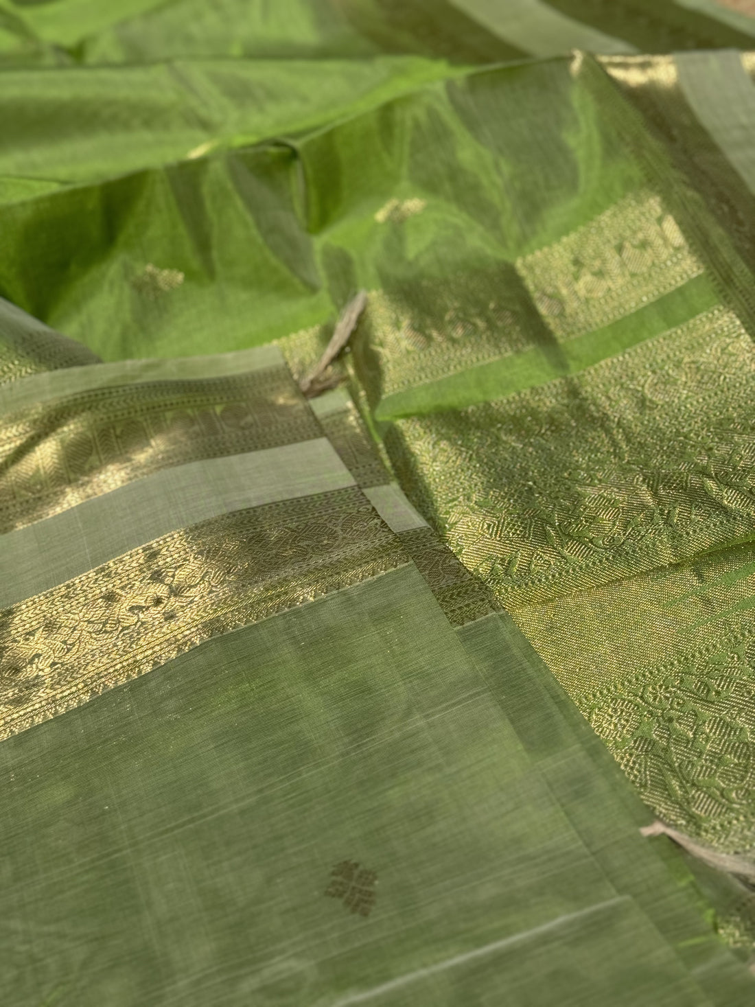 A gorgeous Chartreuse green kanchi silk cotton saree