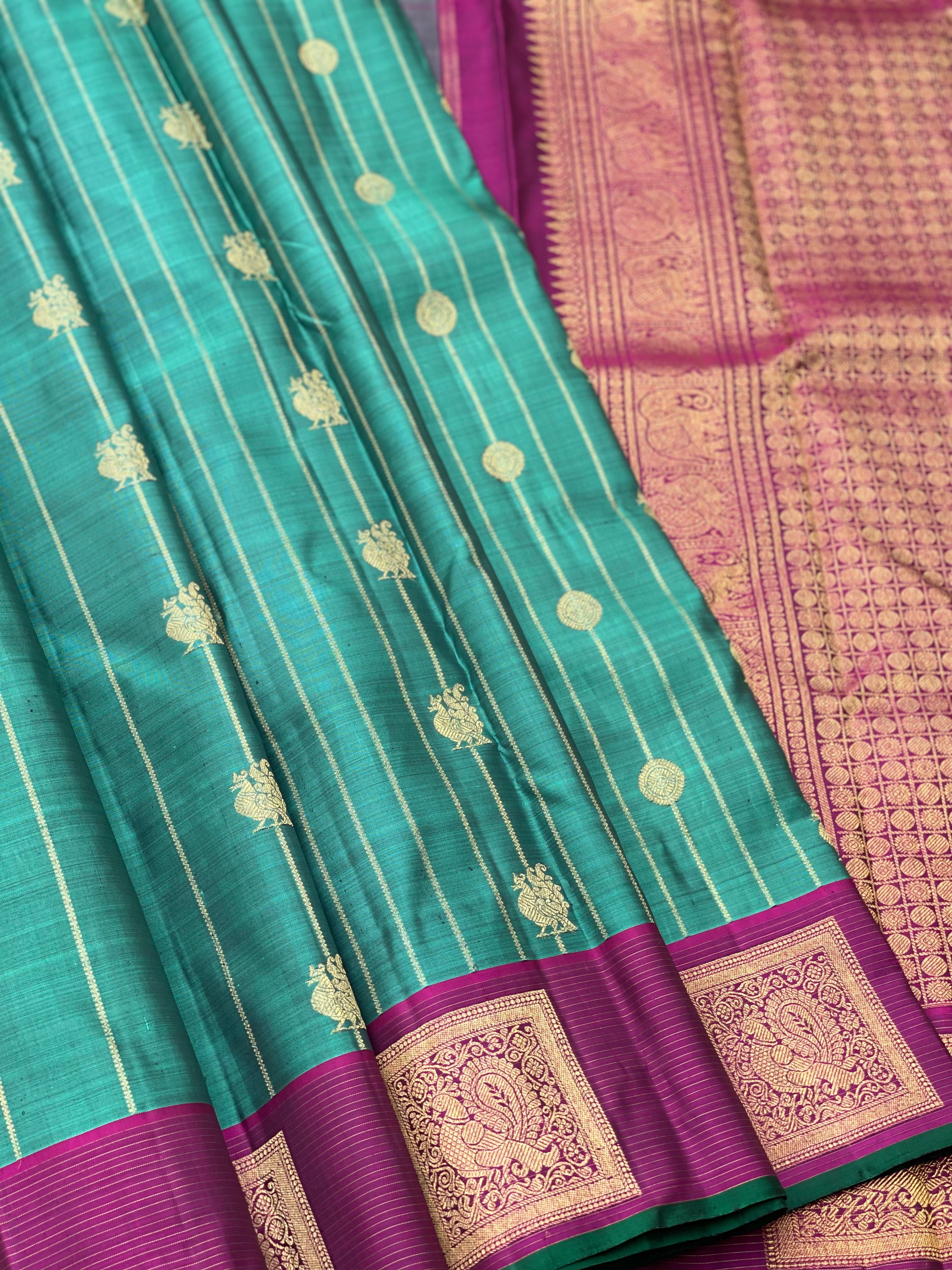 A stunner Emerald Green Vintage Kanchivaram silk saree