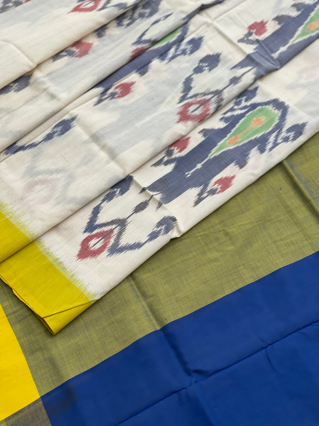 Weft Ikkat cotton saree with Uzbek inspired motifs