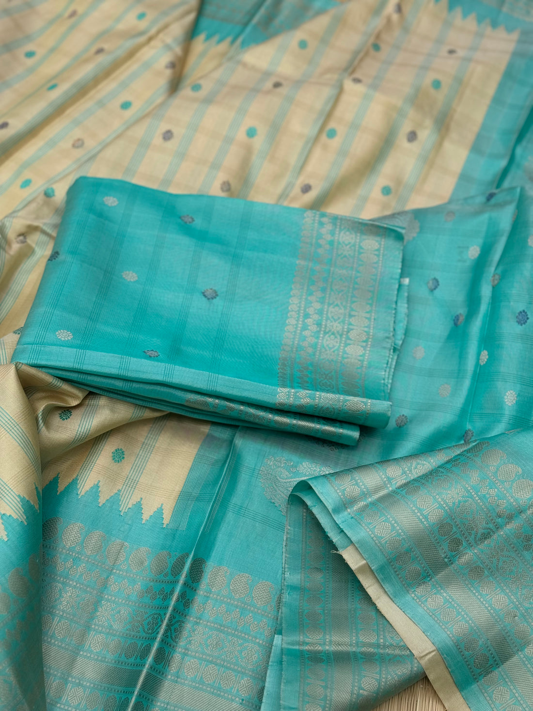 A gorgeous No Zari seagreen with ivory handwoven gadwal silk saree