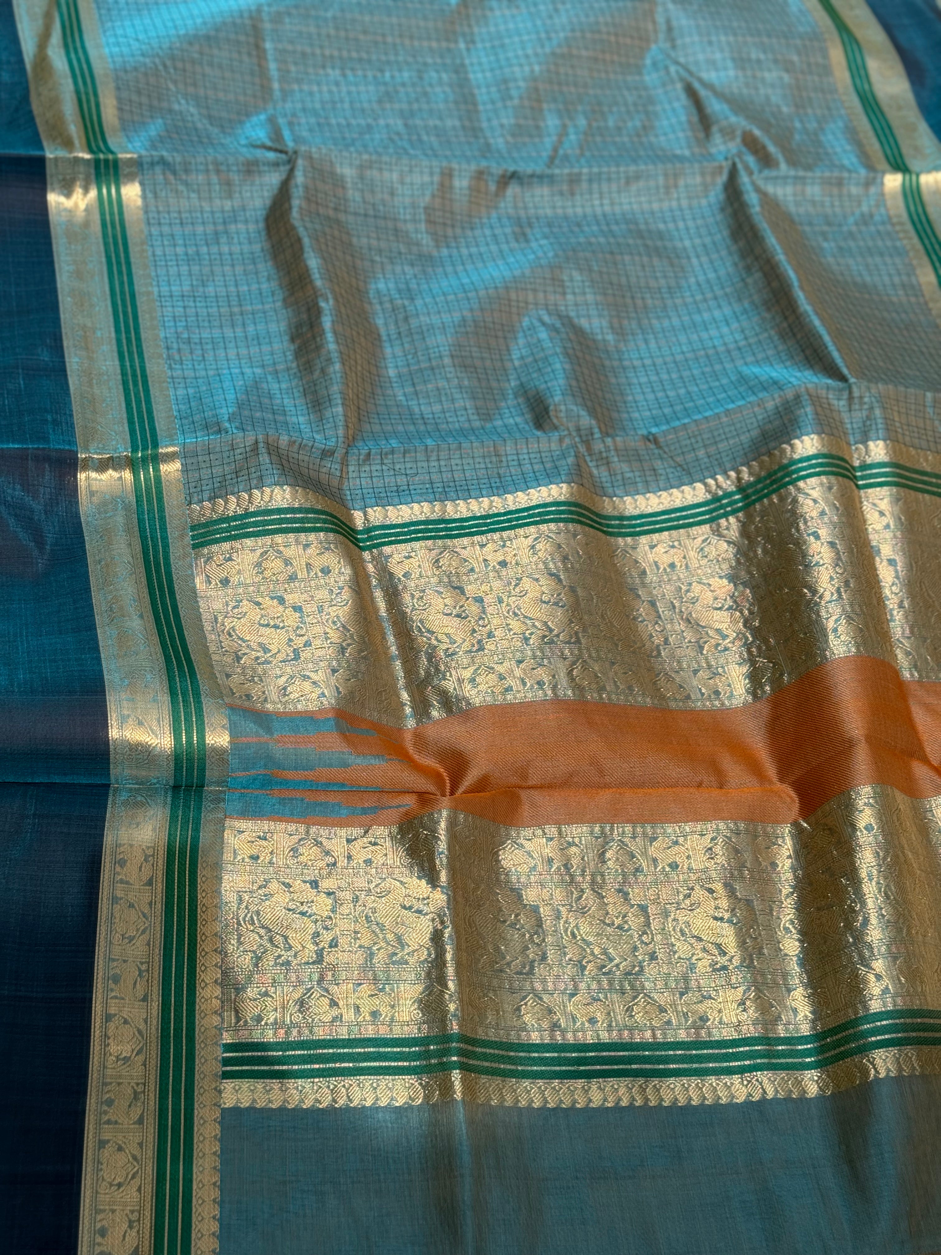 A gorgeous peacock blue shade handwoven lakshadeepam Kanchi silk cotton saree