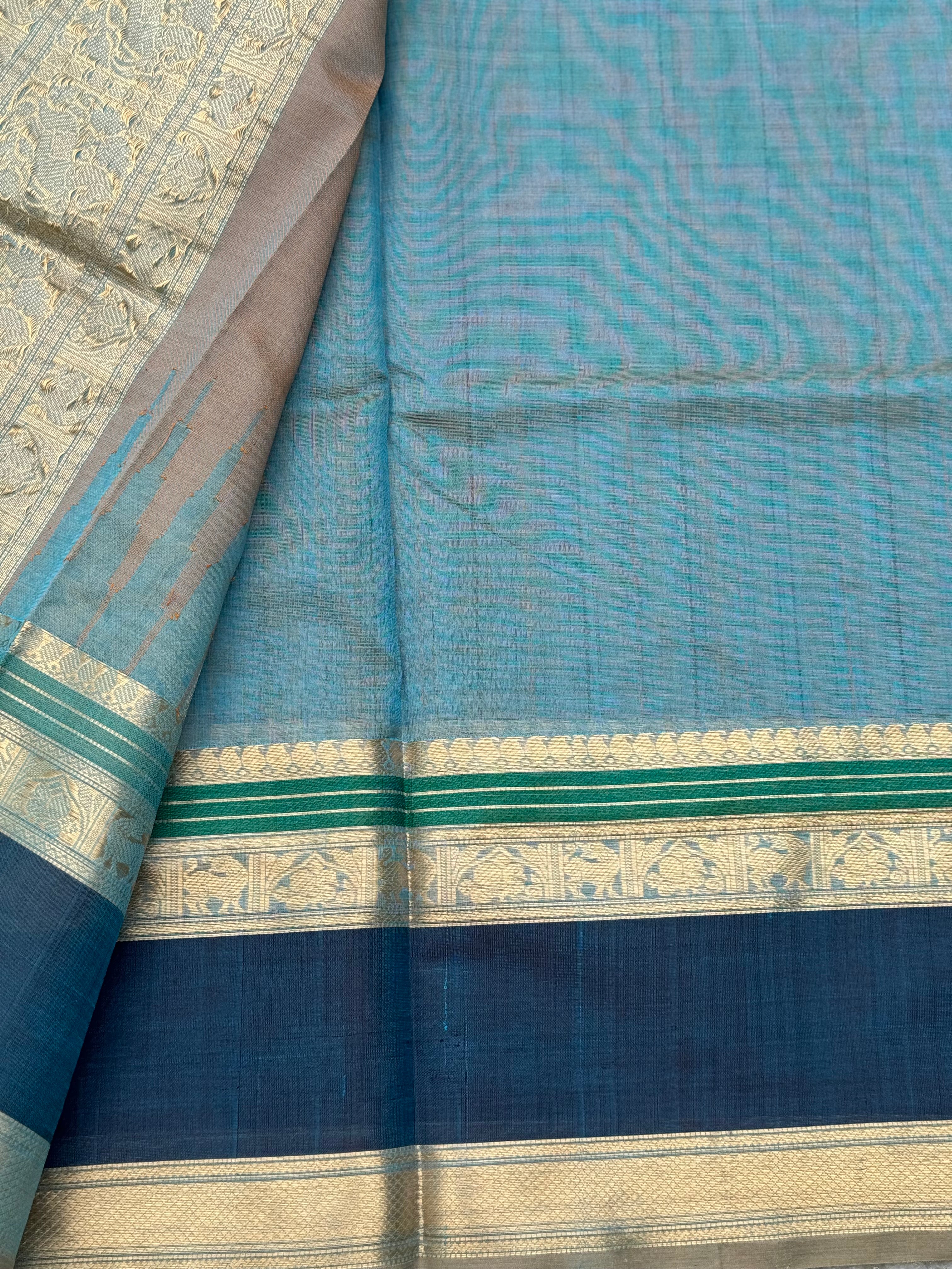 A gorgeous peacock blue shade handwoven lakshadeepam Kanchi silk cotton saree