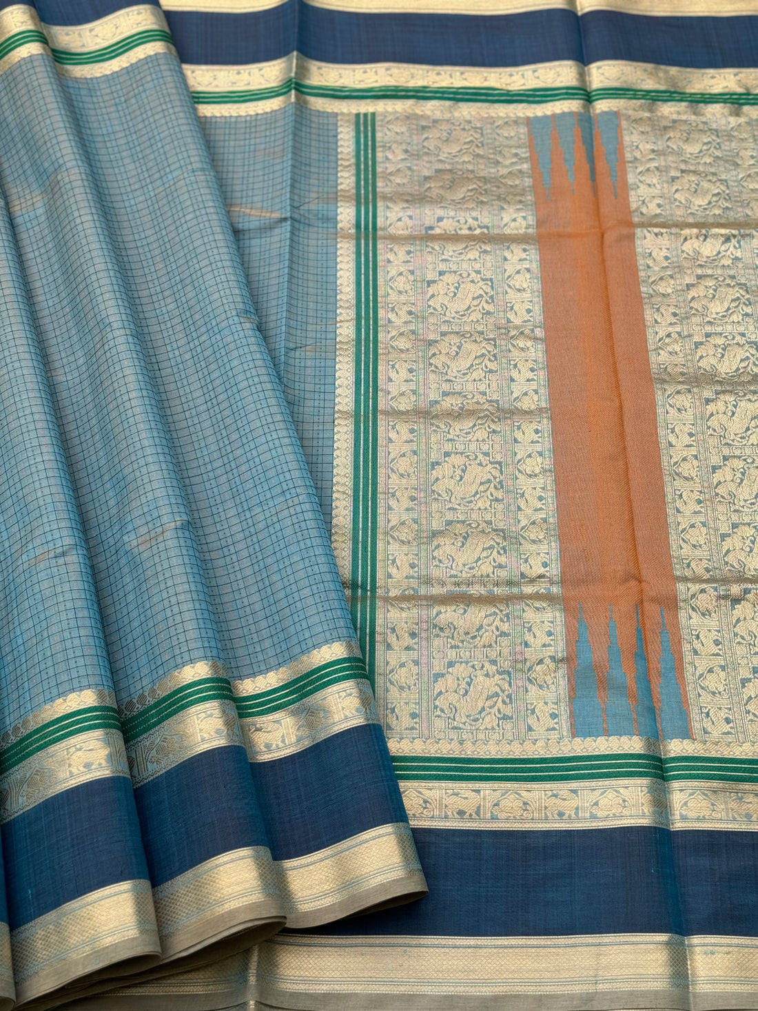 A gorgeous peacock blue shade handwoven lakshadeepam Kanchi silk cotton saree