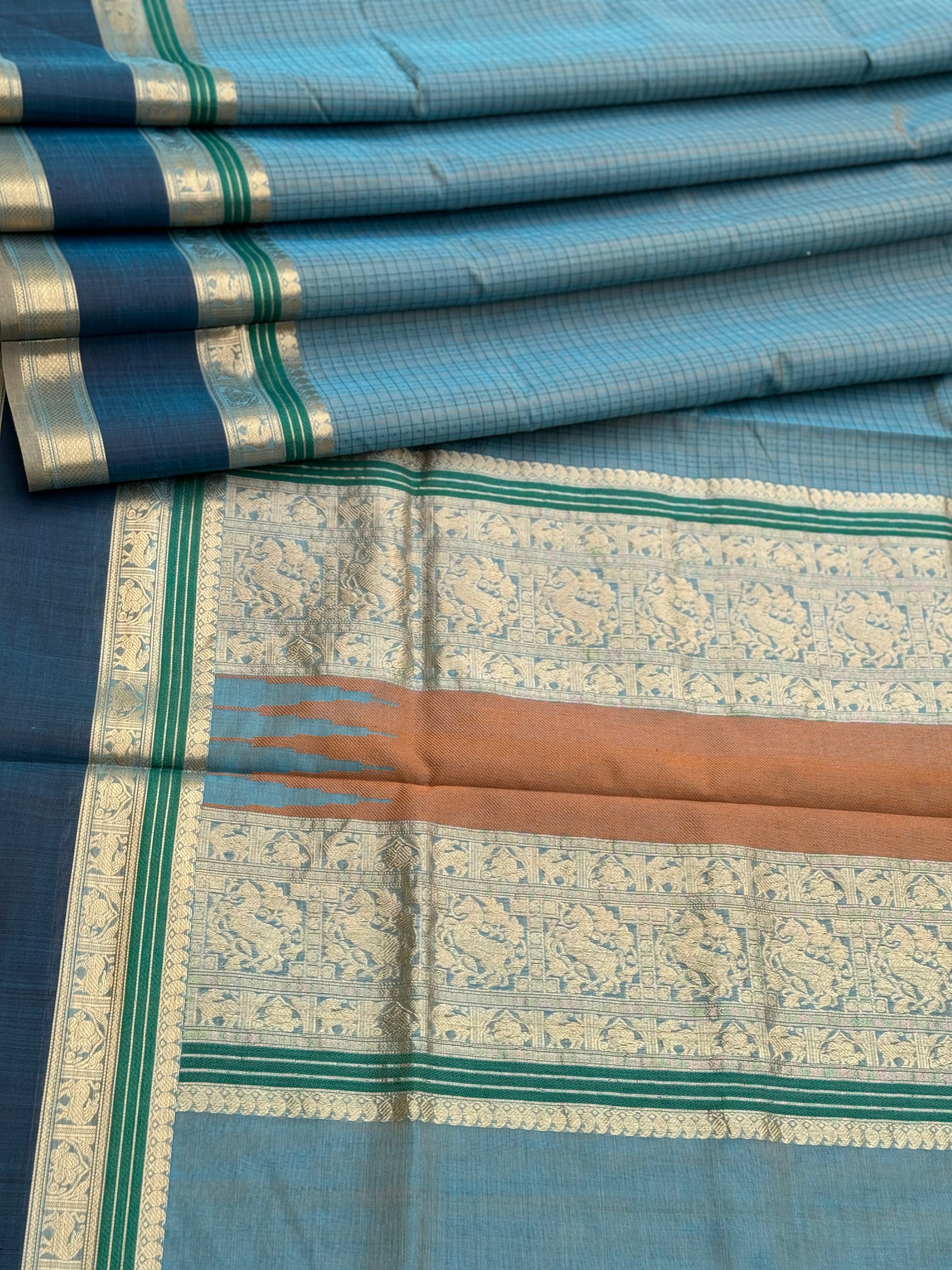 A gorgeous peacock blue shade handwoven lakshadeepam Kanchi silk cotton saree