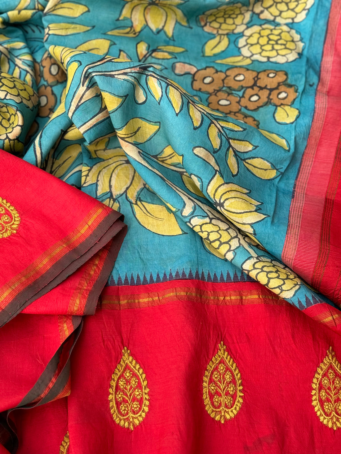 A korvai kanchivaram silk saree with penkalamkari and handmade chikankari embroidered work
