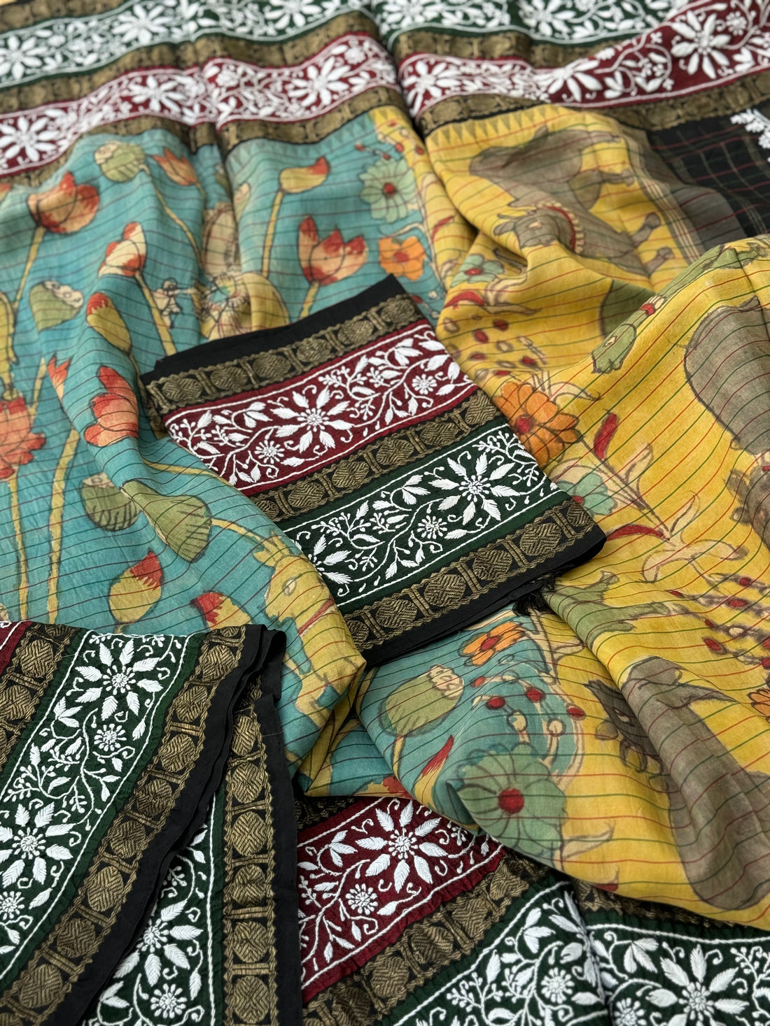 A korvai kanchivaram silk saree with penkalamkari and handmade chikankari embroidered work
