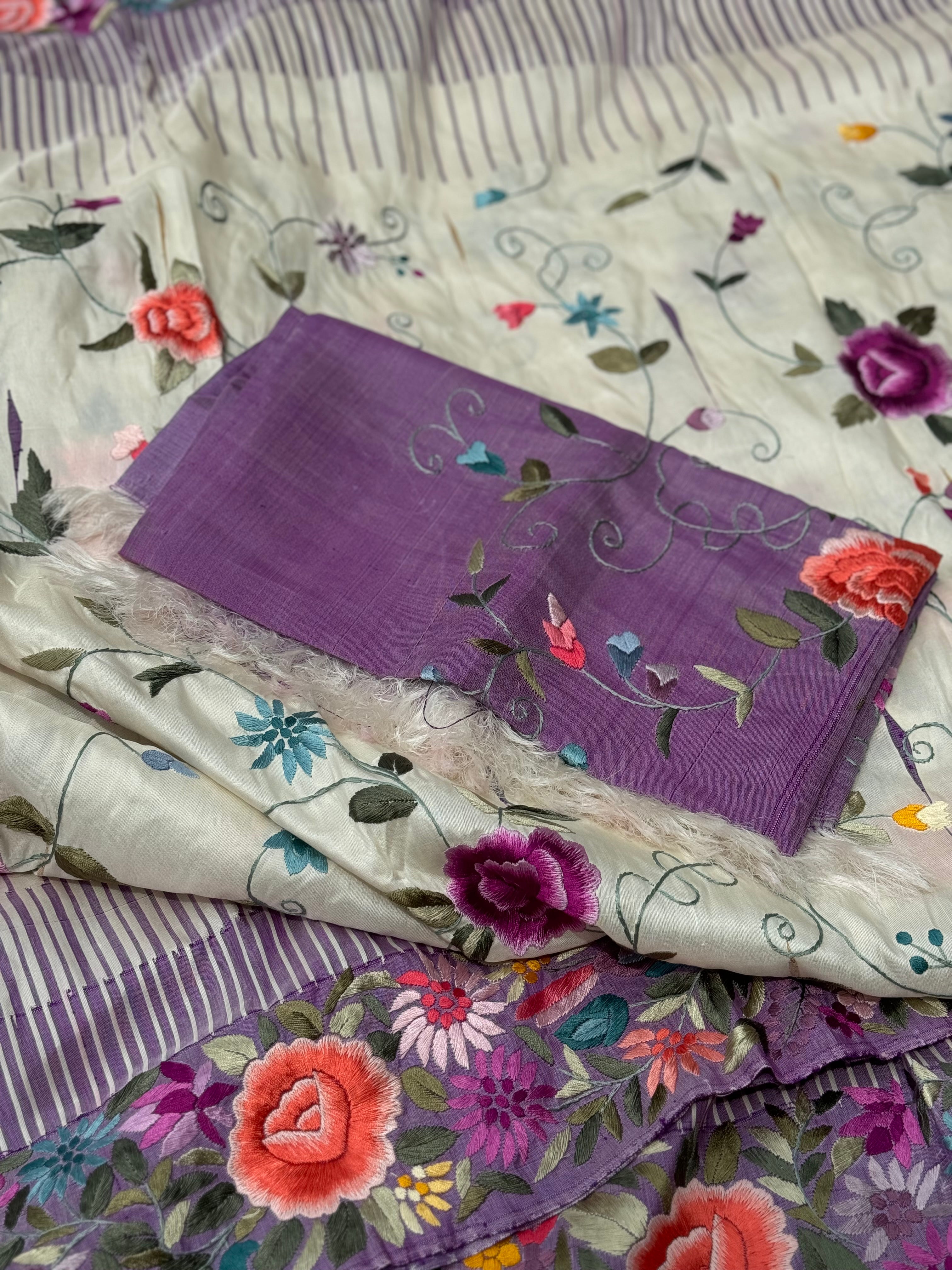 A stupendous kanchivaram silk saree in pastel lavender With authentic Parsi Gara work handmade