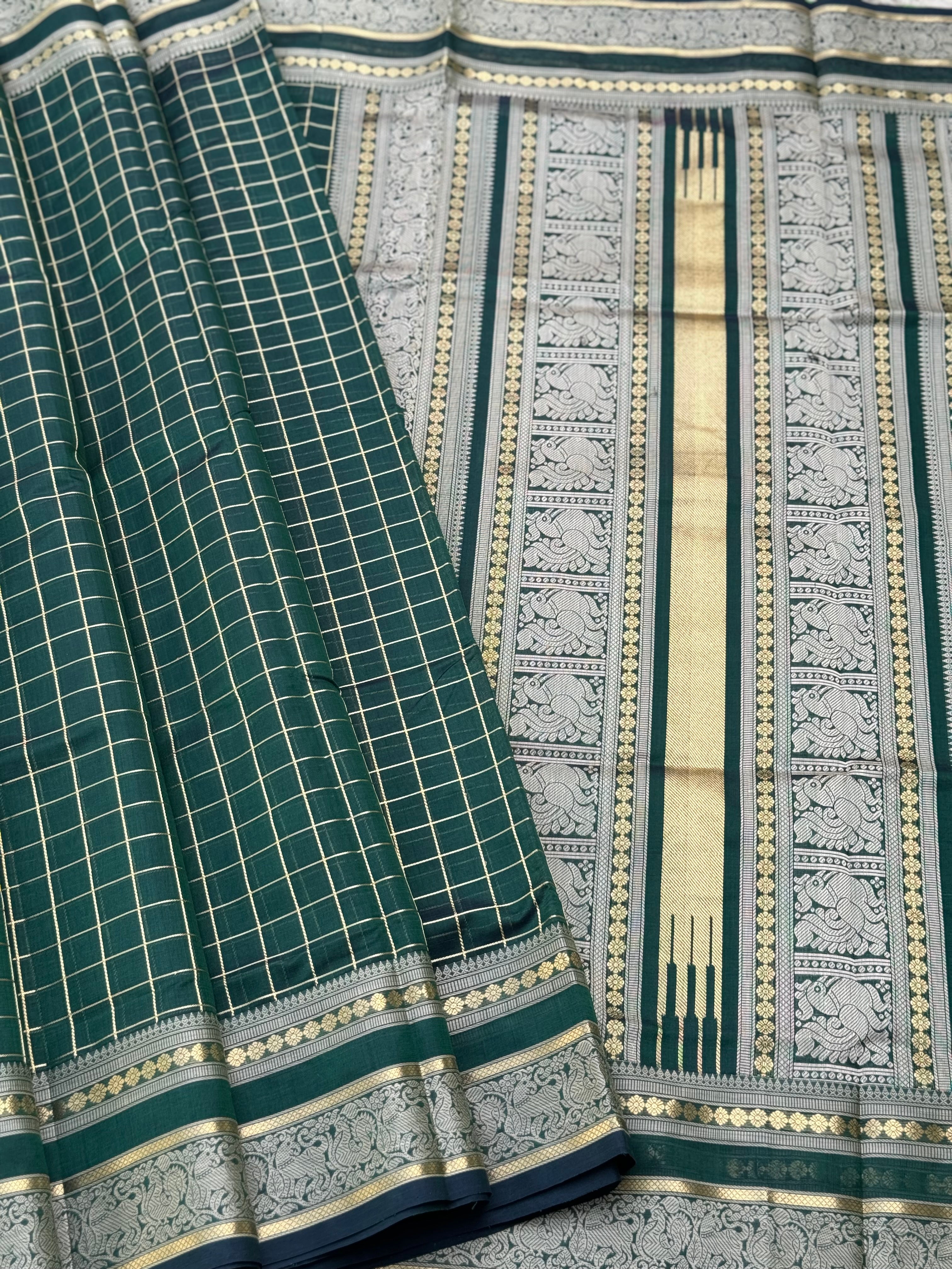 A gorgeous bottlegreen shade handwoven kattam Kanchi silk cotton saree