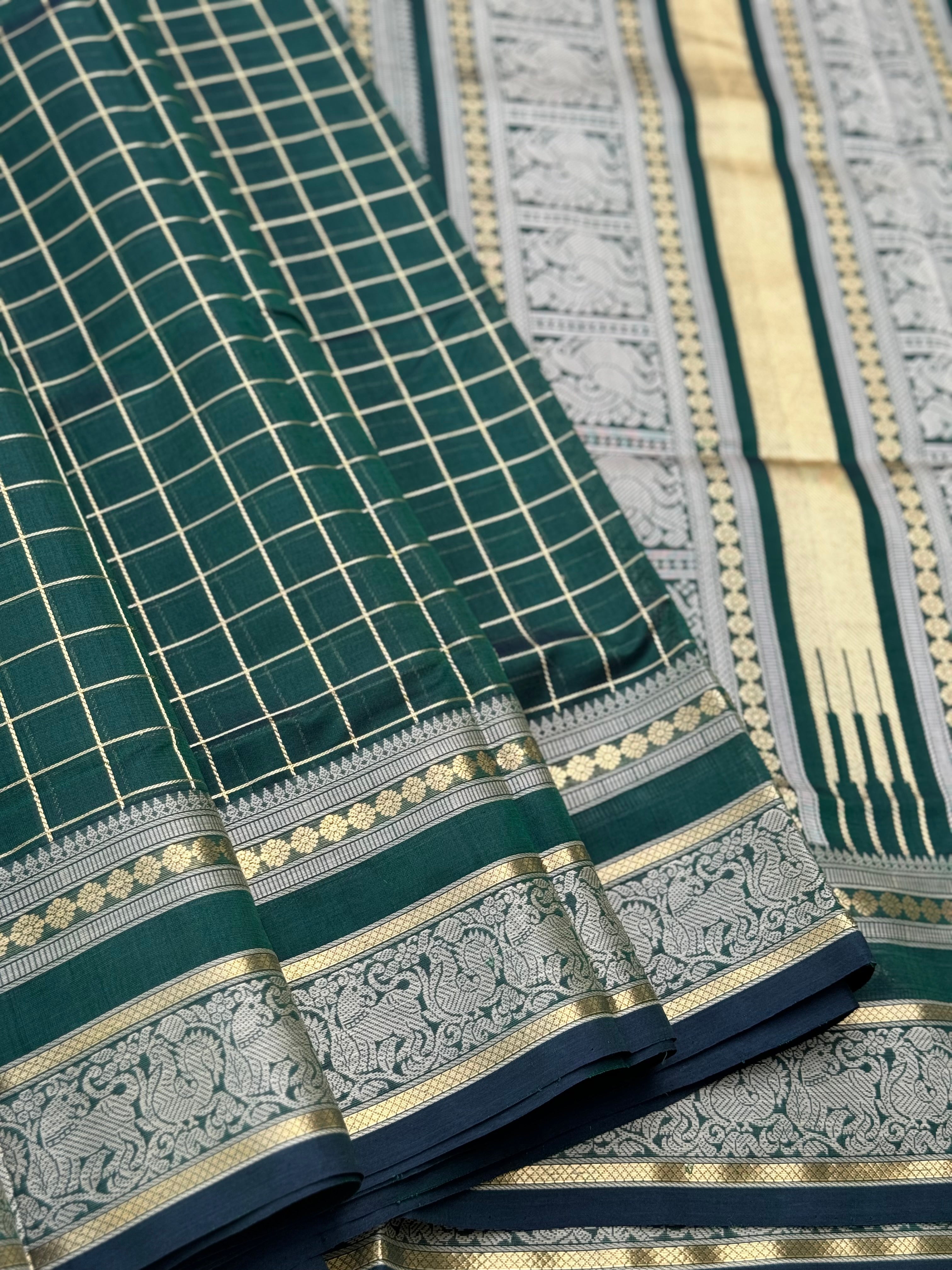A gorgeous bottlegreen shade handwoven kattam Kanchi silk cotton saree