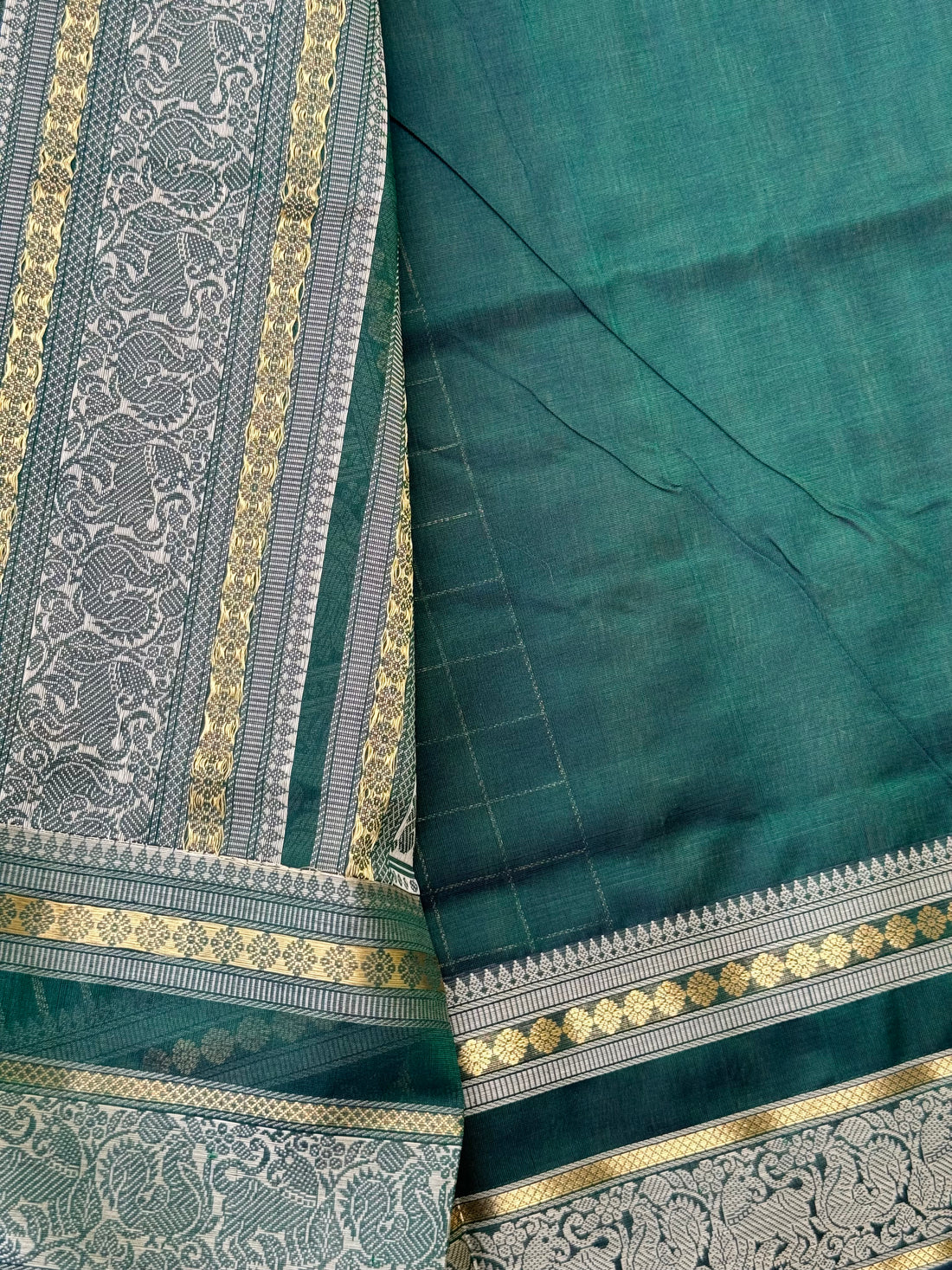 A gorgeous bottlegreen shade handwoven kattam Kanchi silk cotton saree