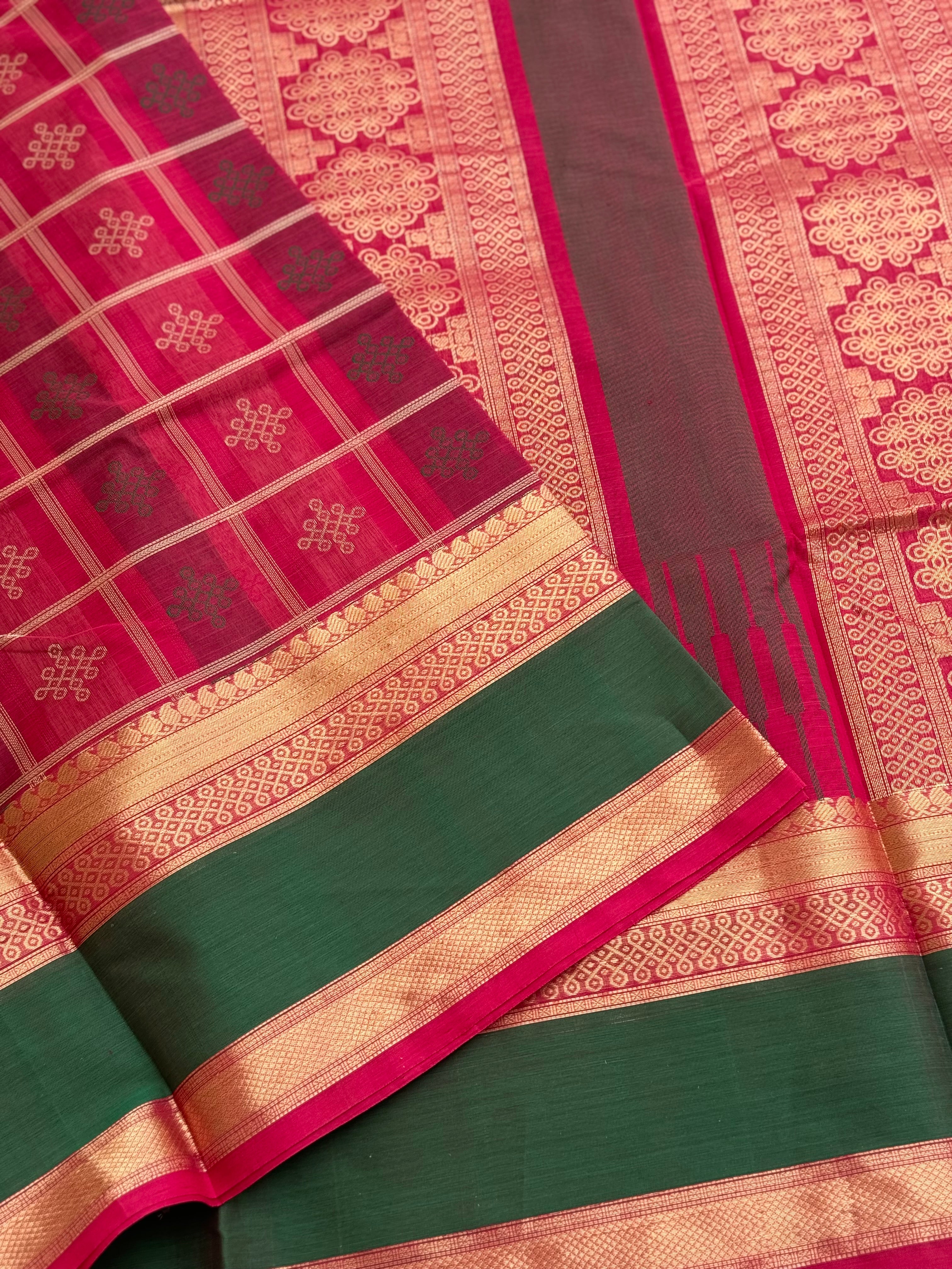 A gorgeous fuchsia pink shade handwoven kolam buttas silk cotton saree