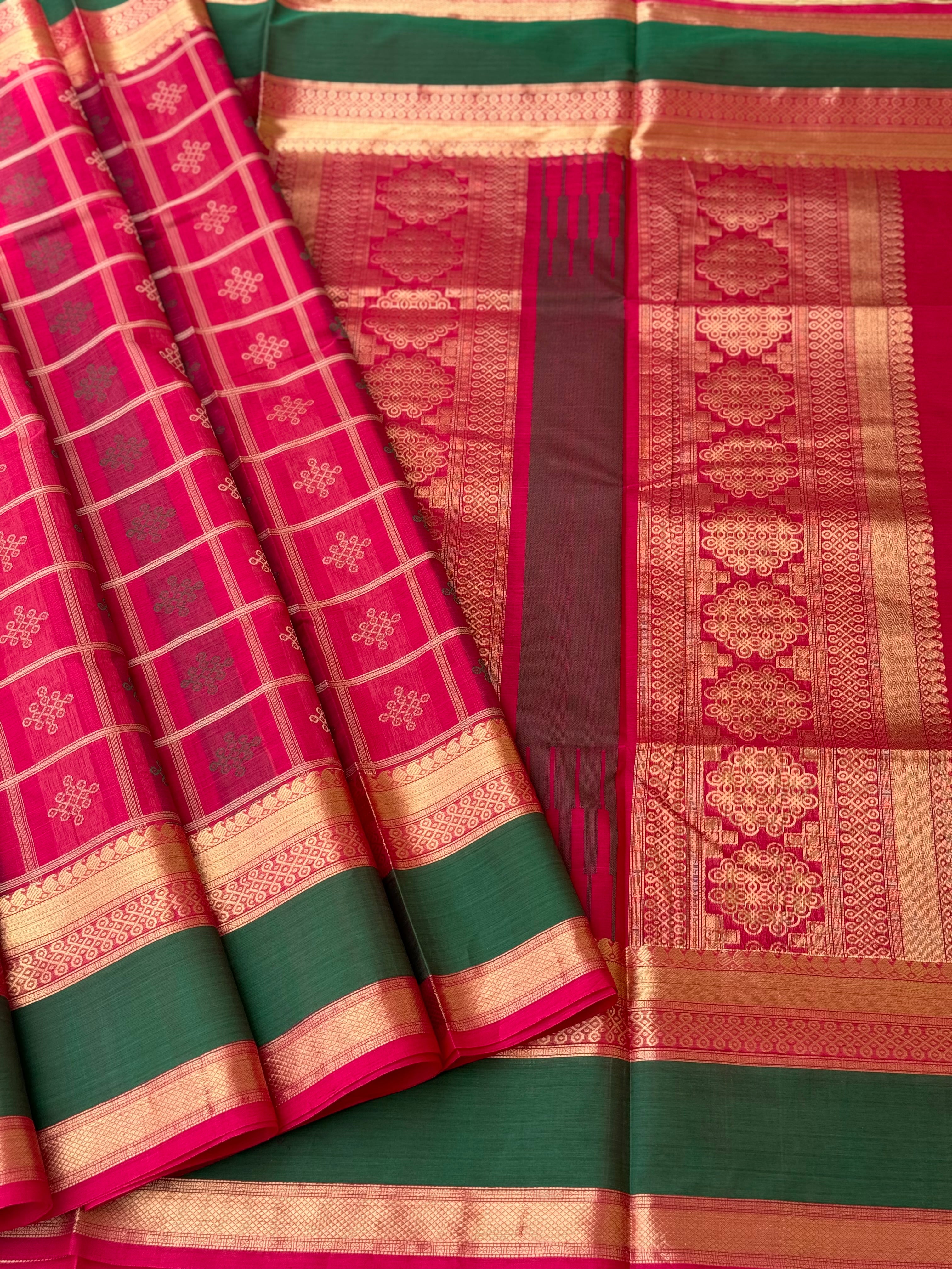 A gorgeous fuchsia pink shade handwoven kolam buttas silk cotton saree