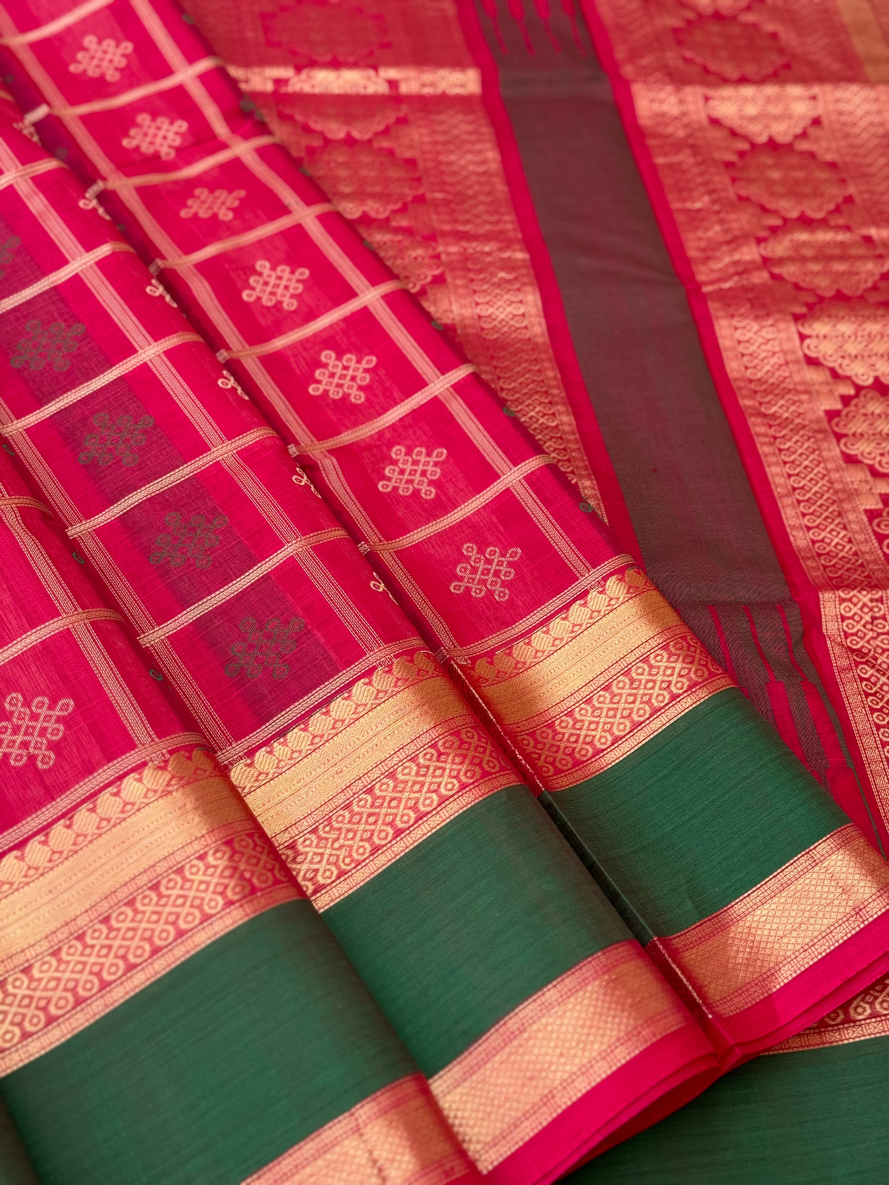 A gorgeous fuchsia pink shade handwoven kolam buttas silk cotton saree