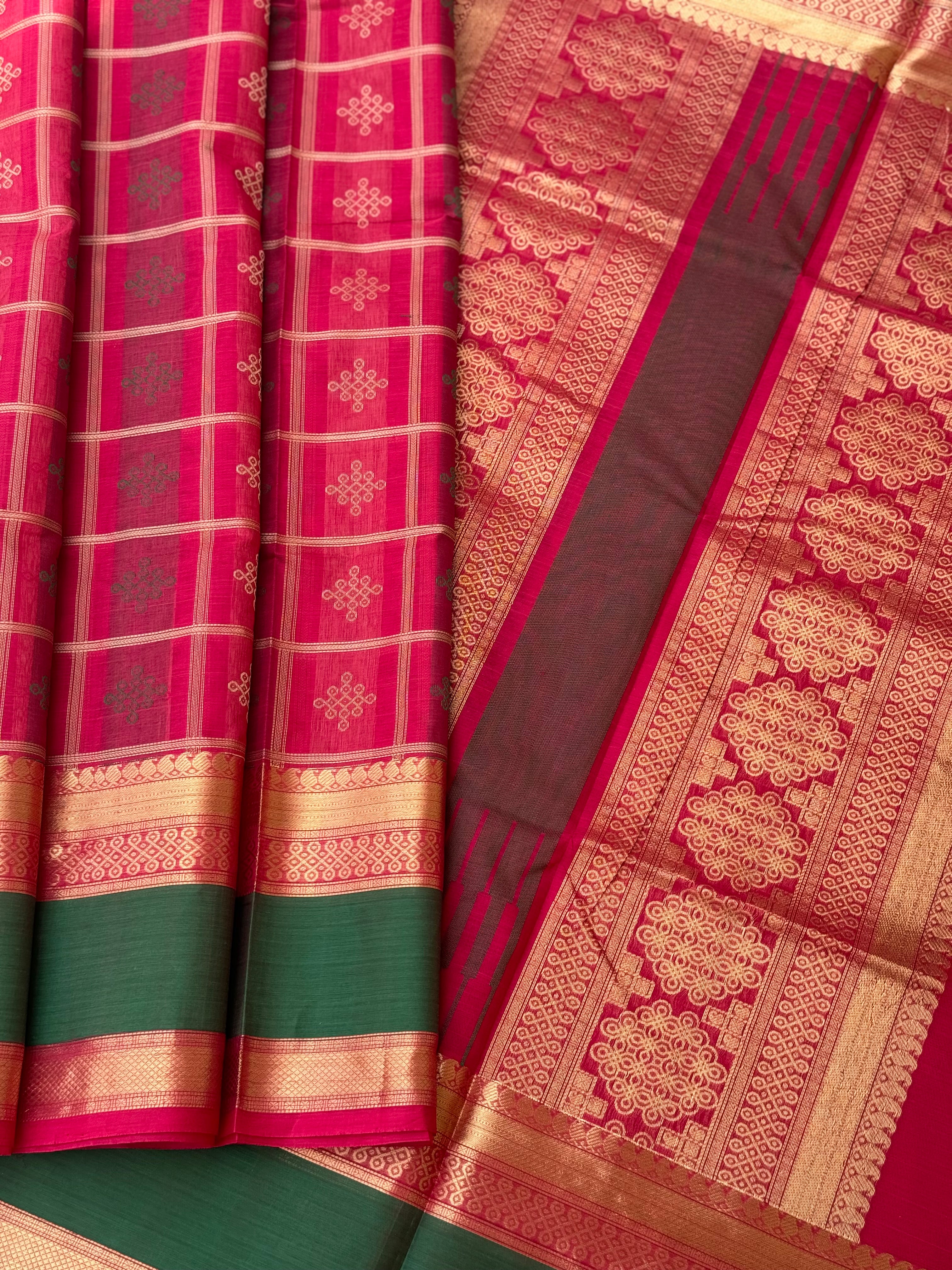 A gorgeous fuchsia pink shade handwoven kolam buttas silk cotton saree