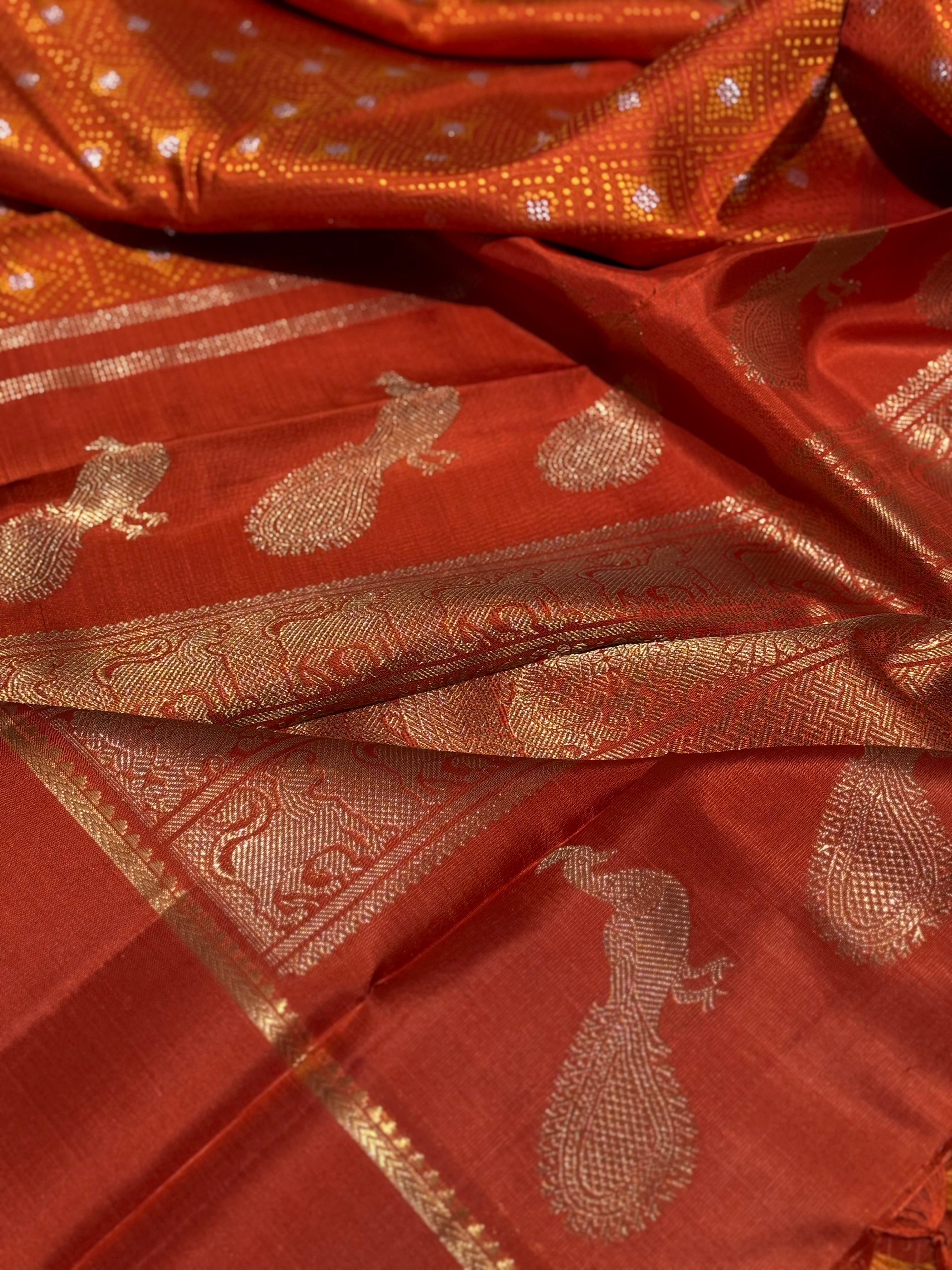 An awe inspiring masterpiece rustic orange shade bhandini inspired kanchivaram silk saree masterpiece