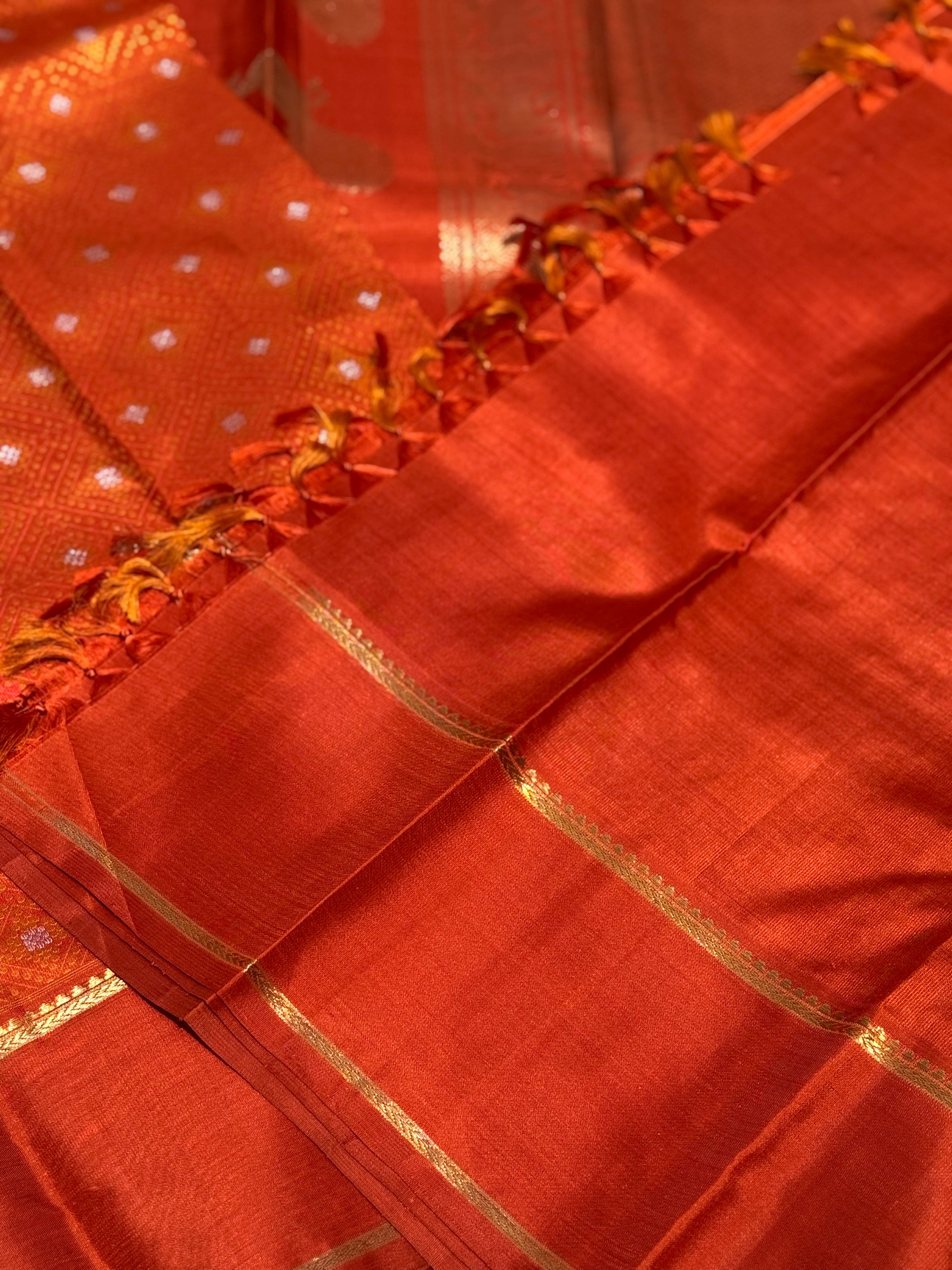 An awe inspiring masterpiece rustic orange shade bhandini inspired kanchivaram silk saree masterpiece