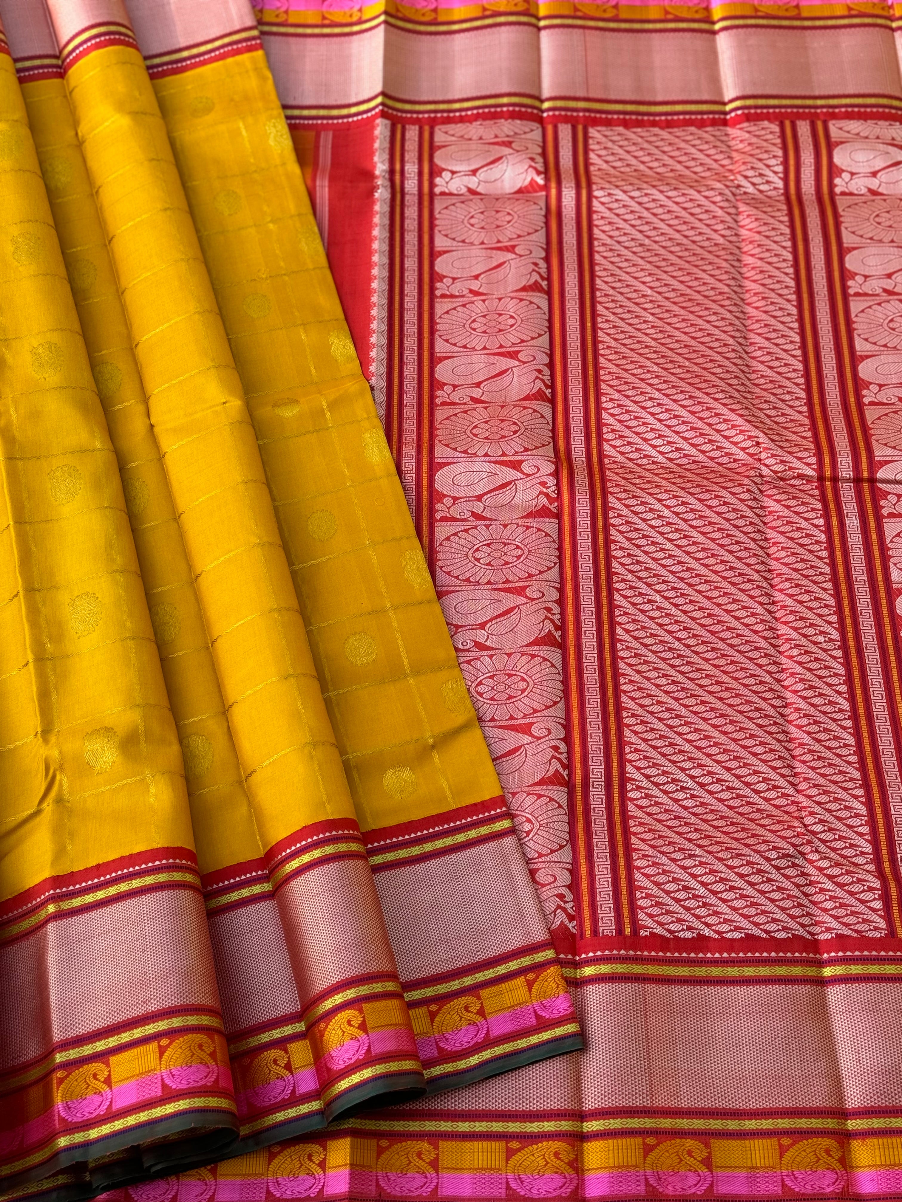 A stunner handwoven golden yellow shade with deep red Korvai kanchivaram silk saree with zari veldhari kattam