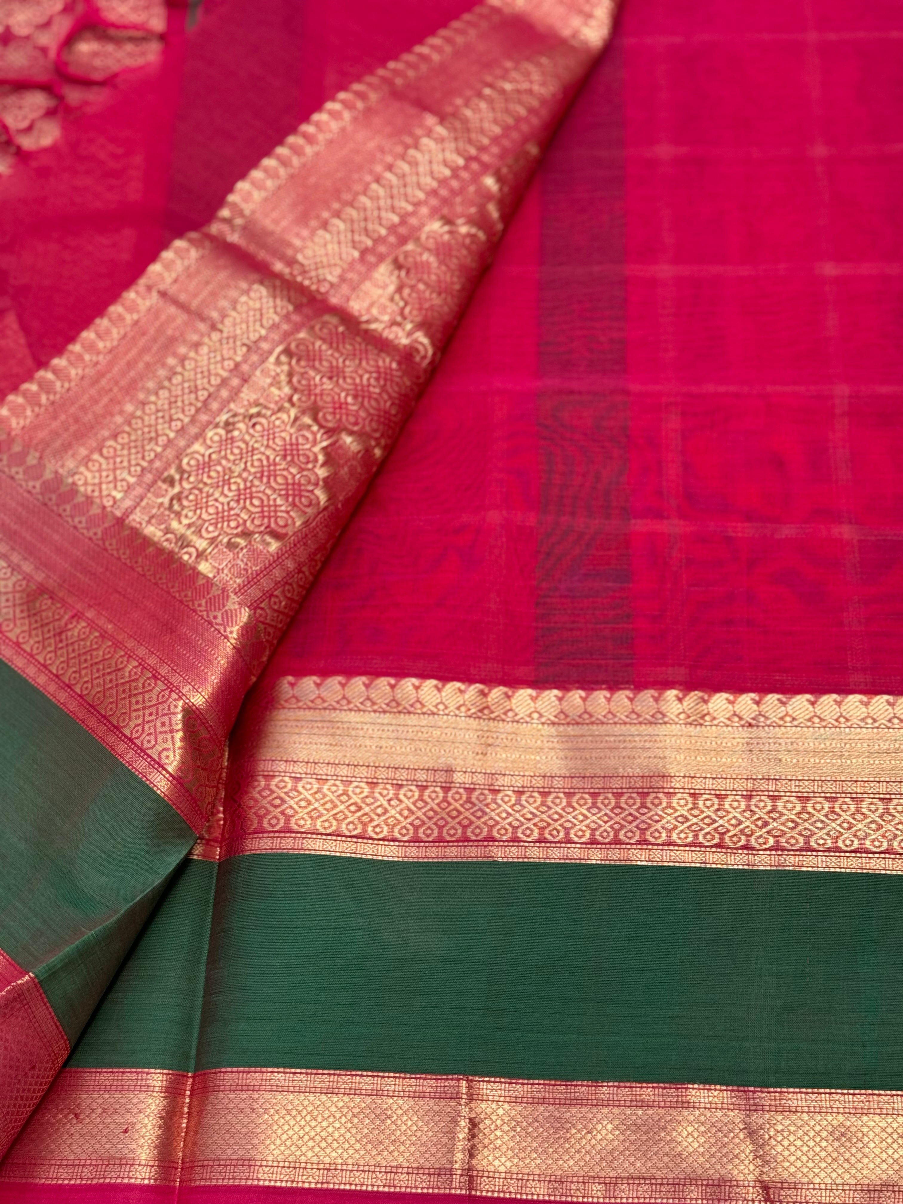 A gorgeous raspberry pink shade handwoven kolam buttas silk cotton saree