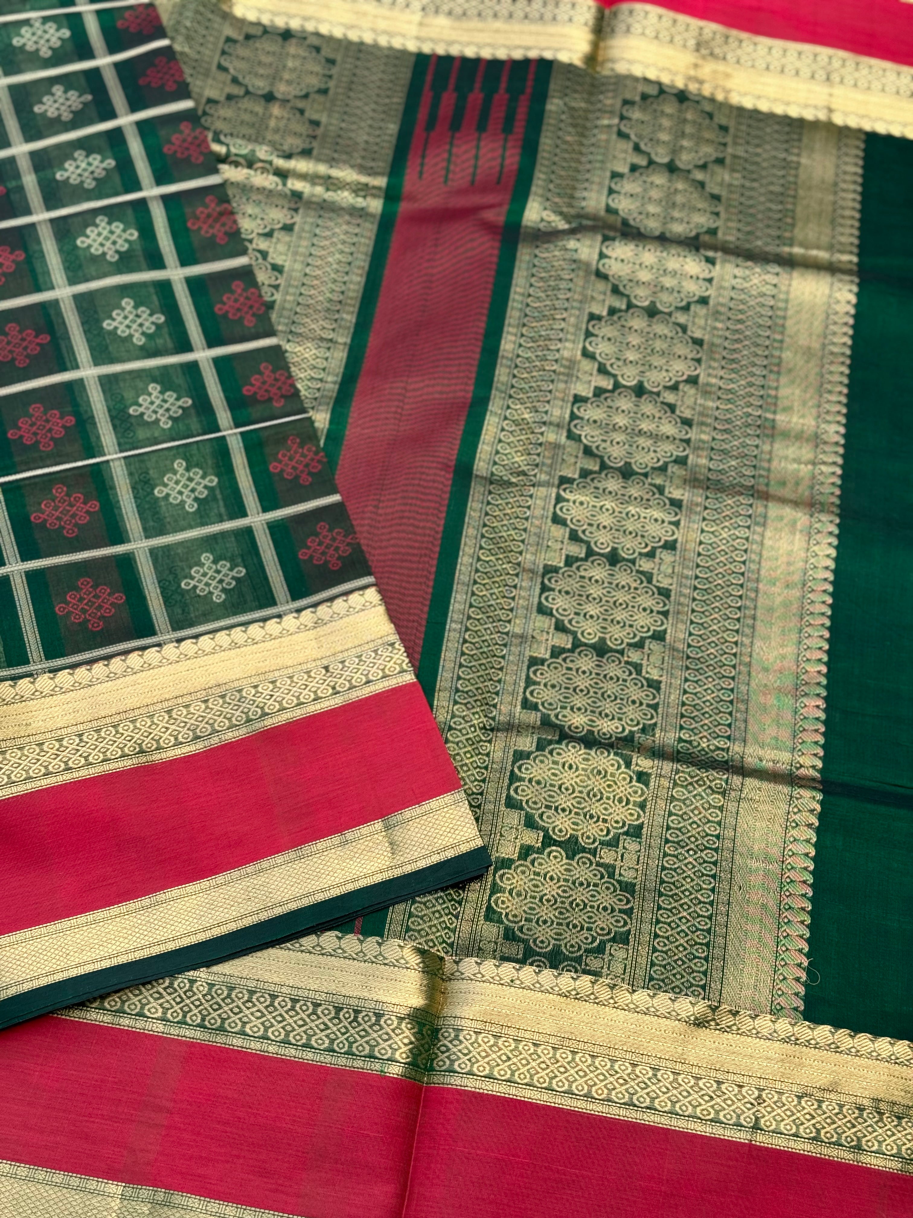 A gorgeous green shade handwoven kolam buttas silk cotton saree