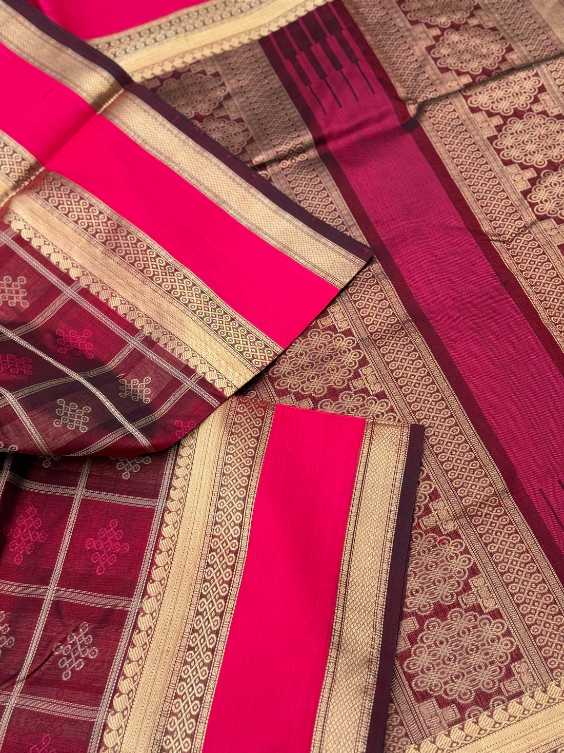 A gorgeous burgundy shade handwoven kolam buttas silk cotton saree