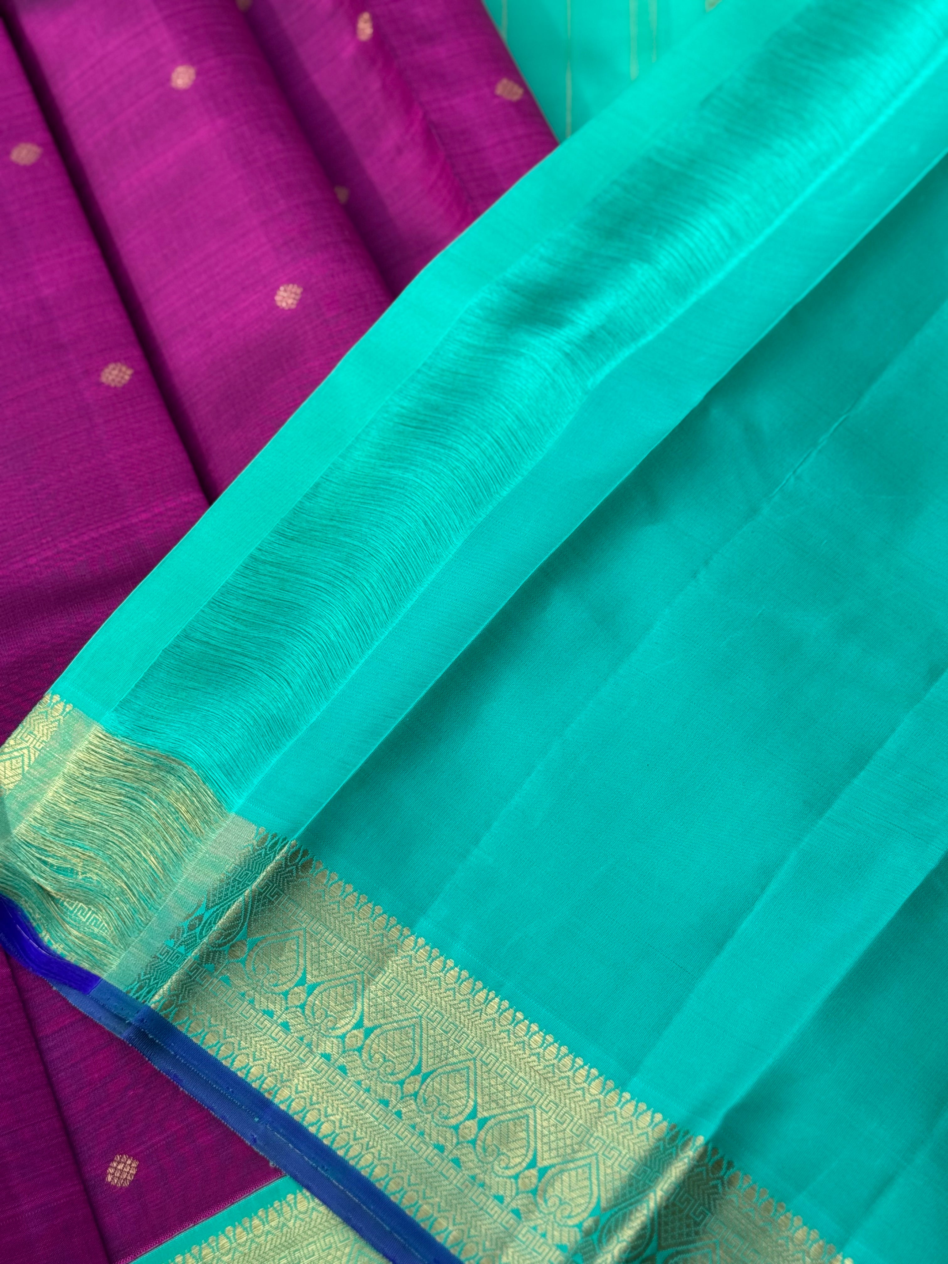 A Masterpiece kanchivaram korvai silk saree in deep plum pink with turquoise foam green