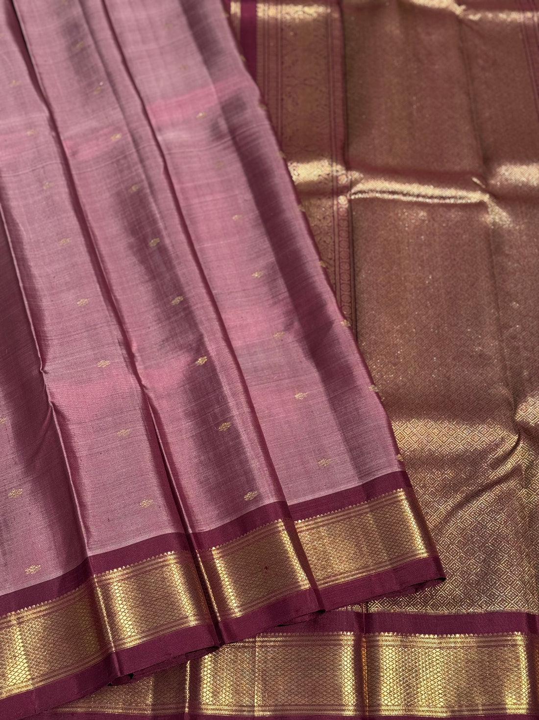 A classy vintage masterpiece Kanchivaram silk saree in deep mauve brown
