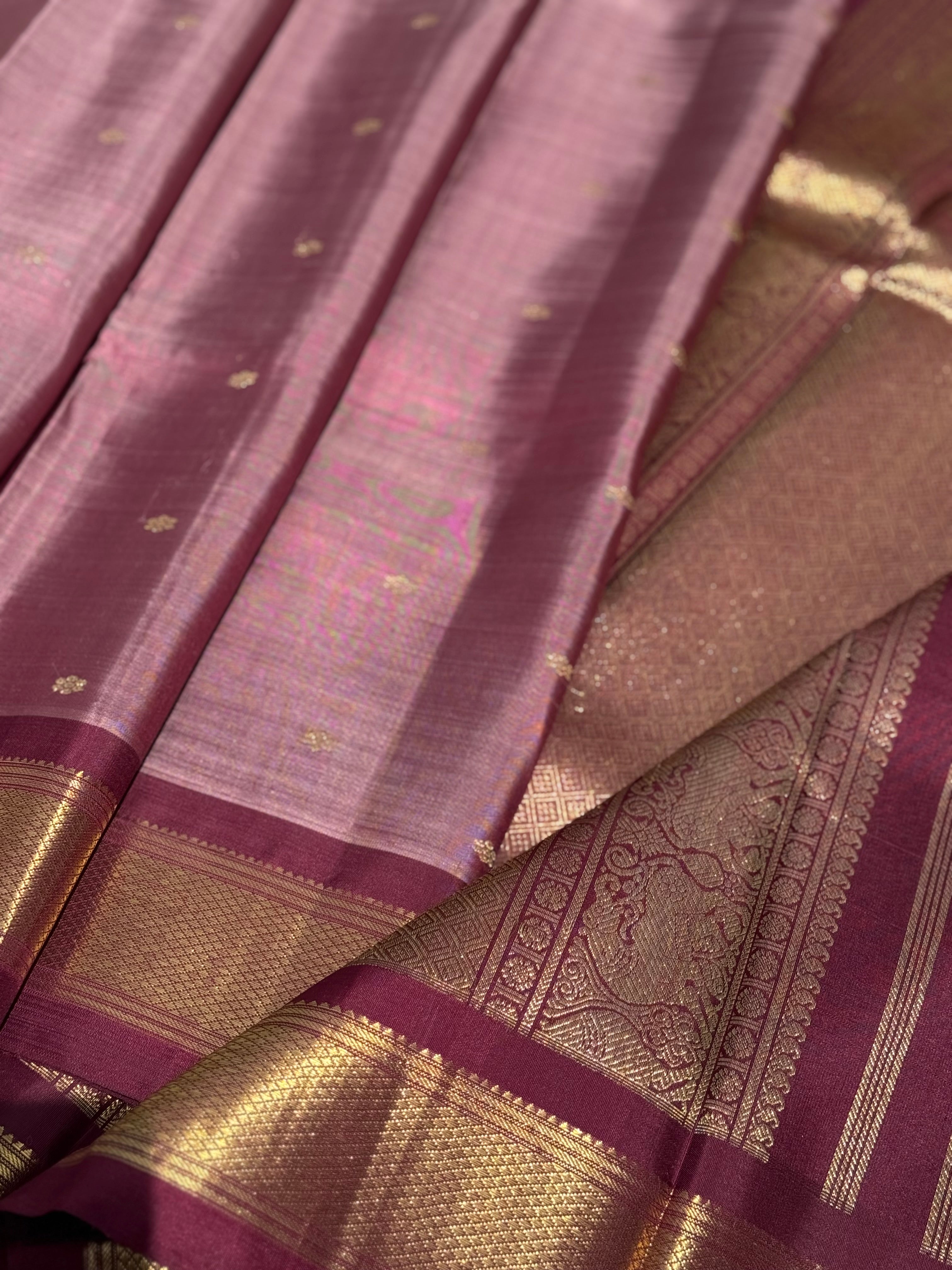 A classy vintage masterpiece Kanchivaram silk saree in deep mauve brown