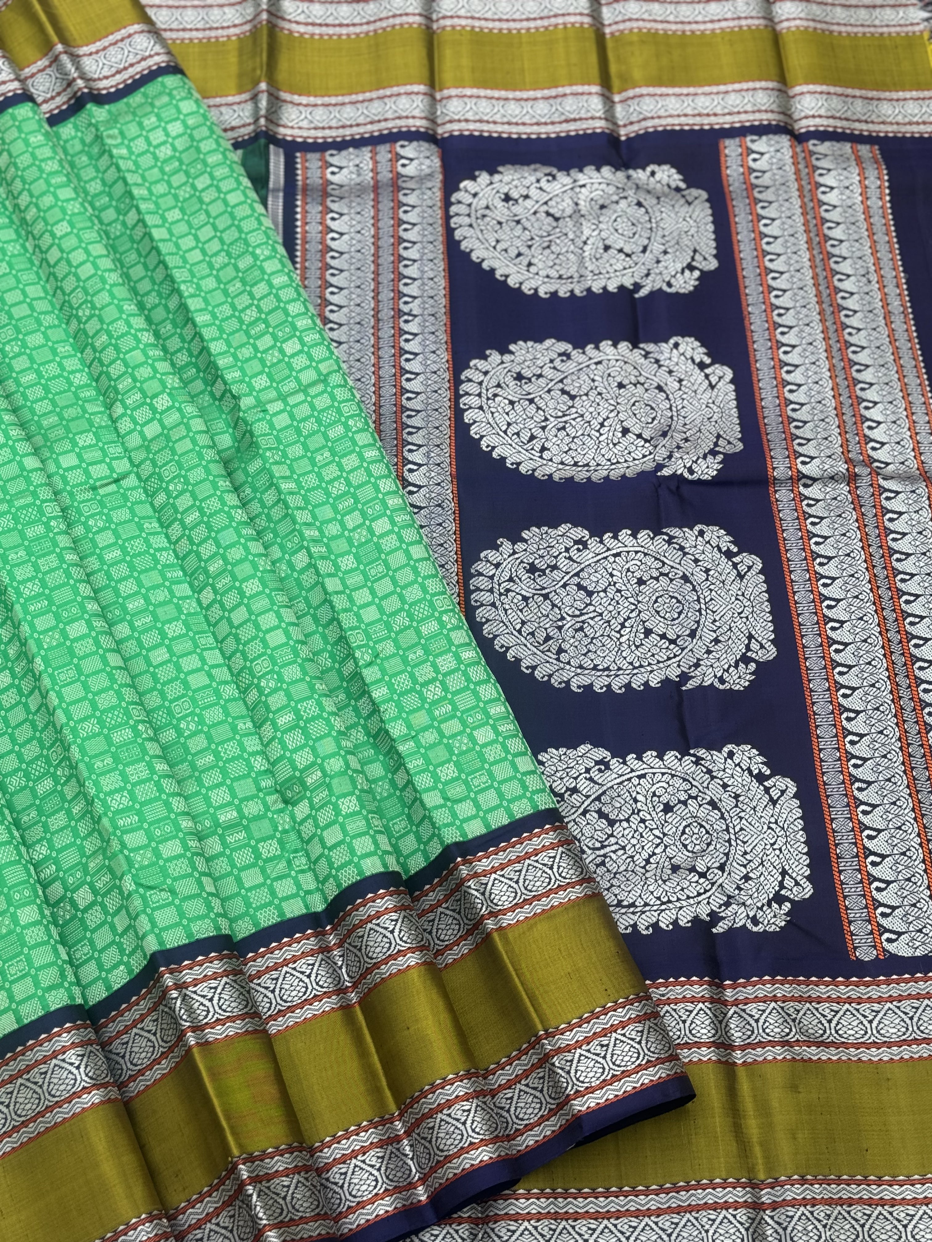 A stunner Masterpiece 48 motifs korvai kanchivaram woven silk saree with threadwork